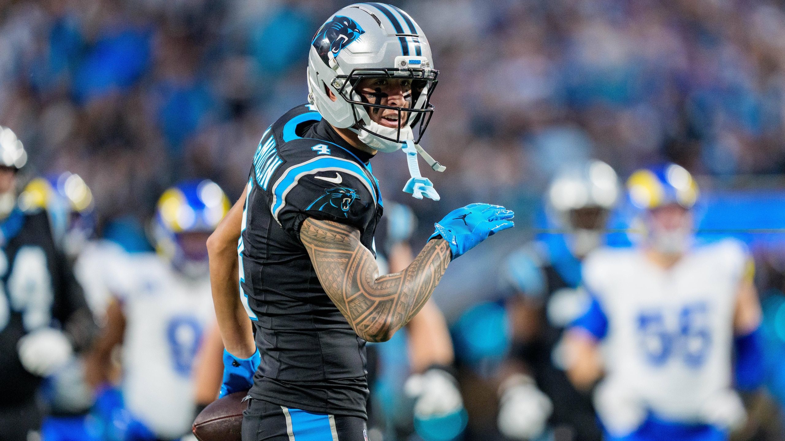 2560x1440 Tetairoa McMillan Wins 2025 26 NFL Offensive Rookie Of The Year Award Over Tyler Shough, Jaxson Dart