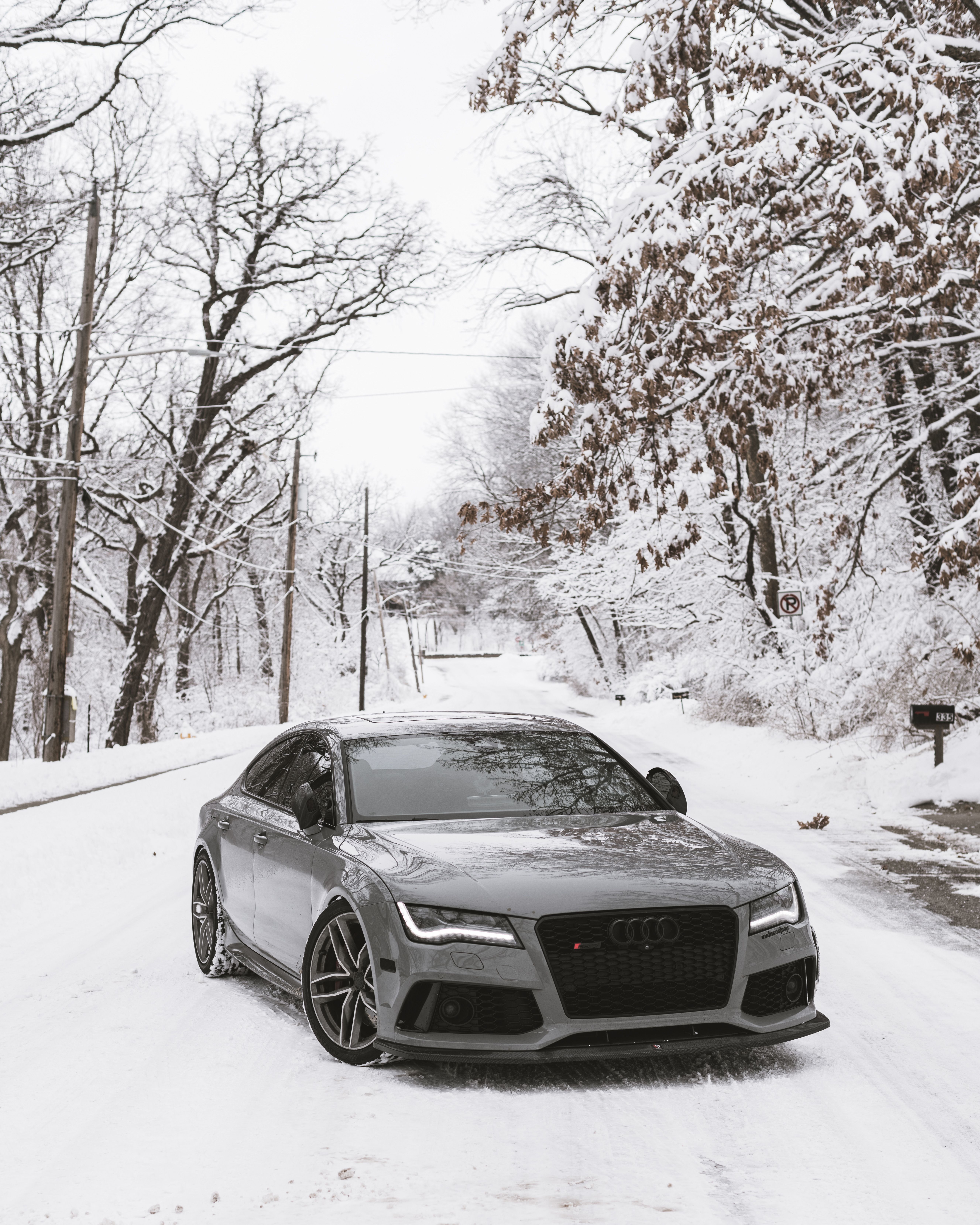 5309x6636 A Gray Audi S7 on a Snow Covered Road · Free