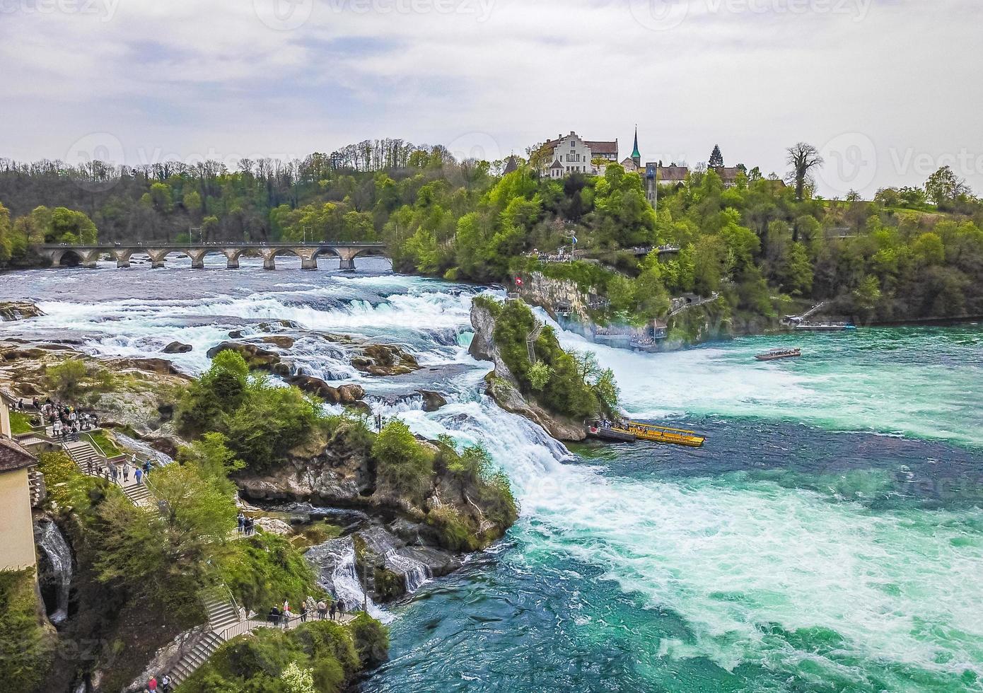 1390x980 the famous rhine falls in the swiss near the city of Schaffhausen day and blue sky
