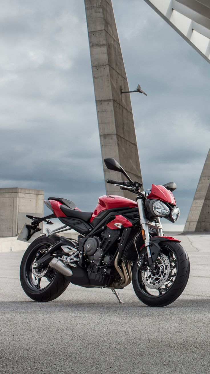 736x1308 Vehicles / Triumph Street Triple (1080x1920) Mobile Wallpaper