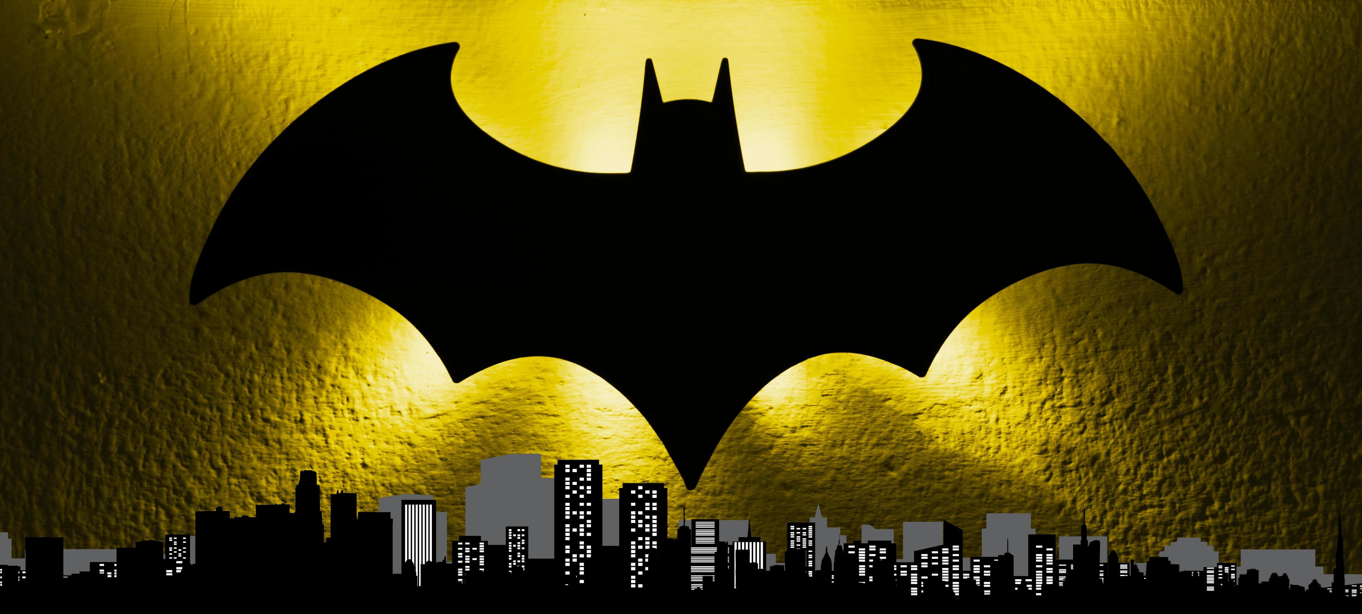 4342x1960 Bologna, Italy, 2017 bat signal light from the Gotham cityscape to celebrate the Batmans birthday. Batman day concept