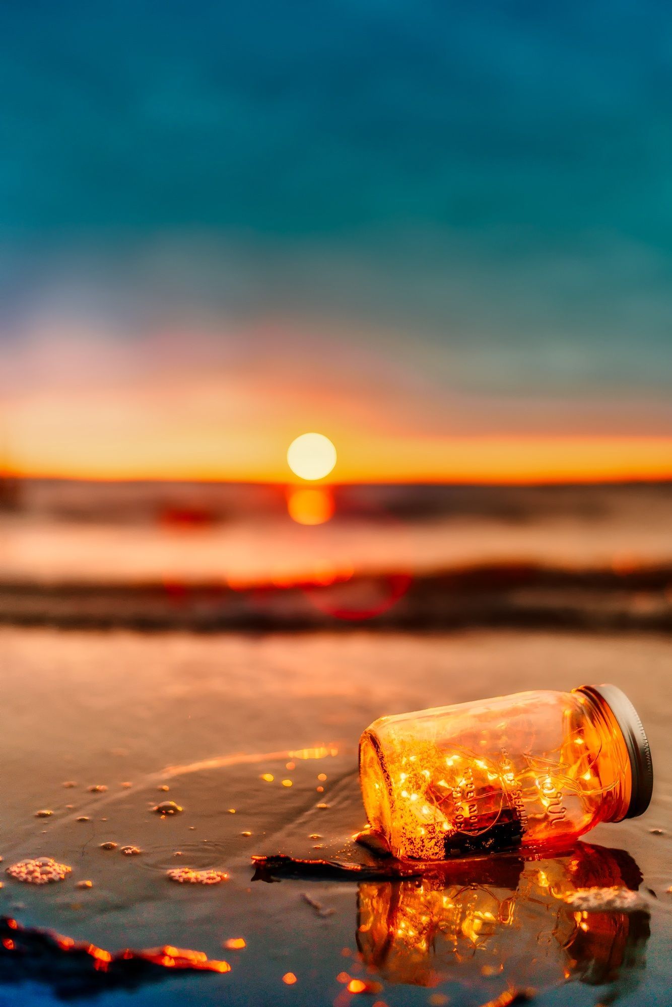 1334x2000 Orange Mason Jar in Body of Water · Free