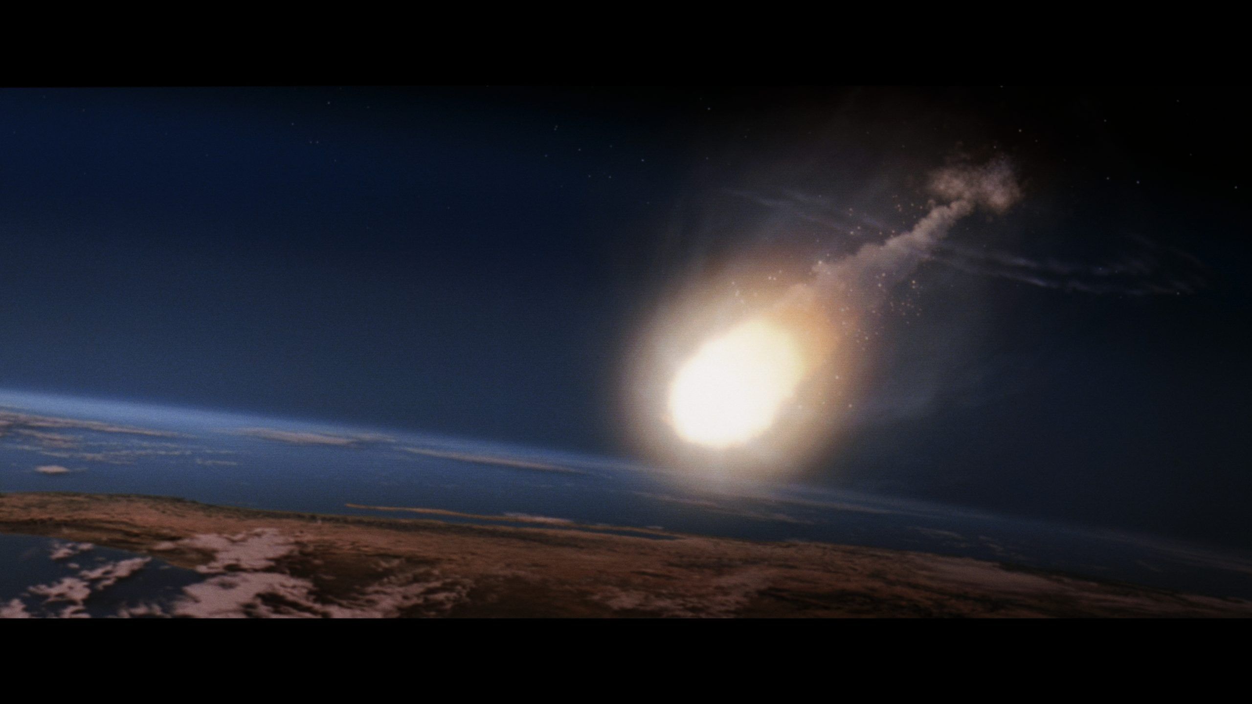 2560x1440 Animated apocalyptic wallpaper of an impending asteroid impact