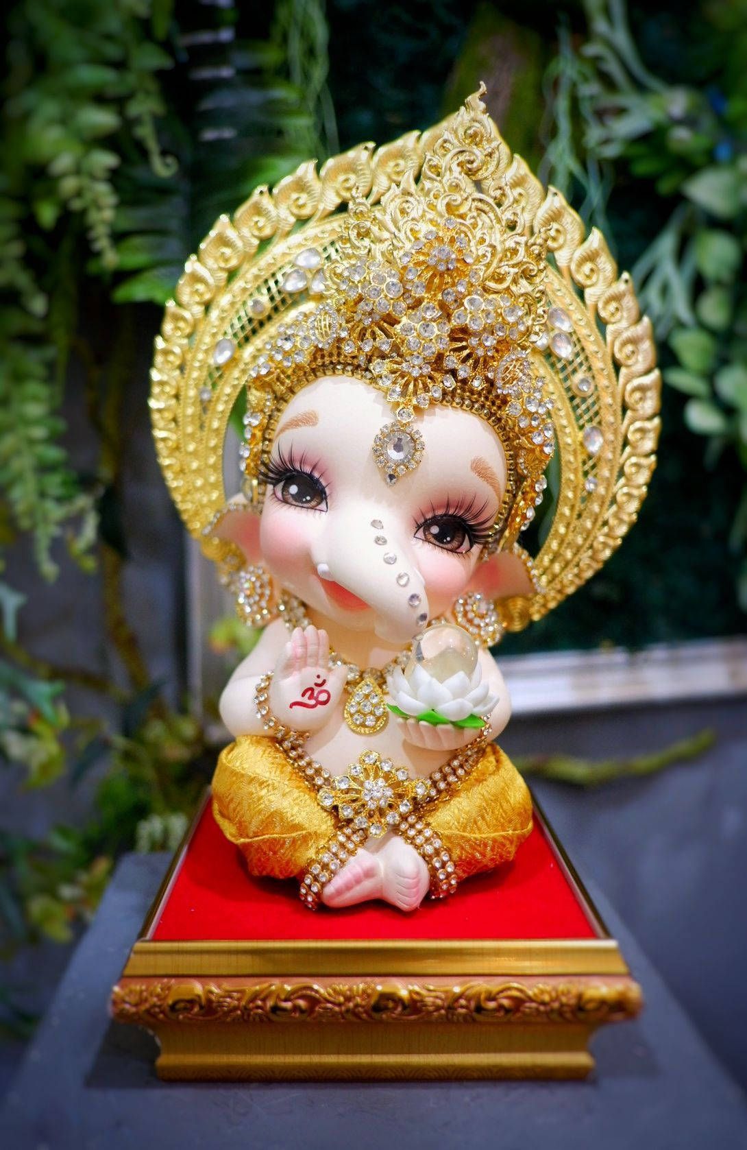 1090x1677 Download Peaceful Baby Ganesh Blessing with White Lotus Wallpaper
