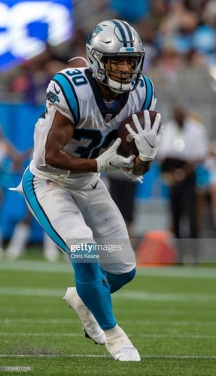 735x1276 Chuba Hubbard of the Carolina Panthers runs the ball against the