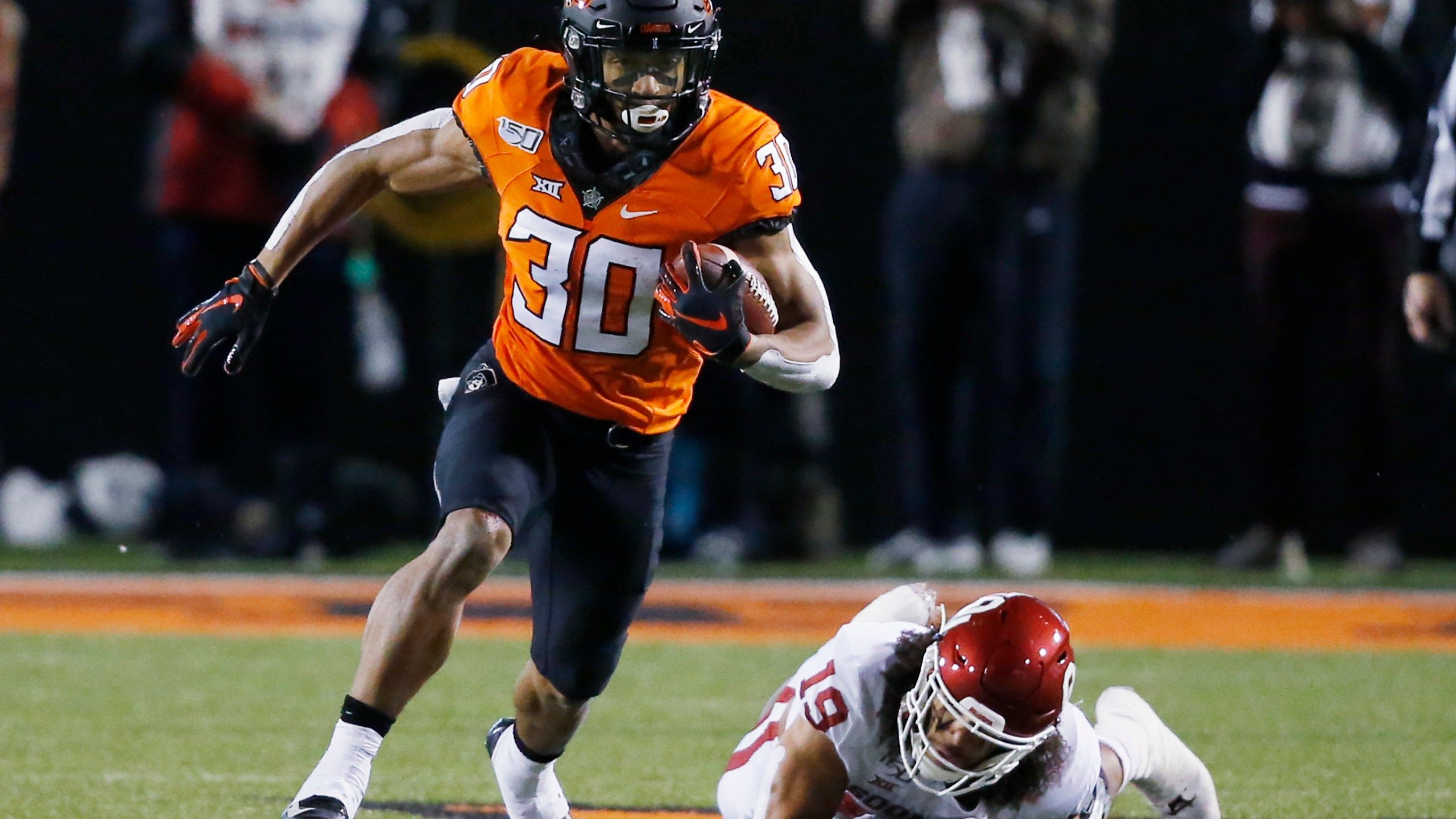 2560x1440 Gundy's OAN support angers star Oklahoma St RB Chuba Hubbard