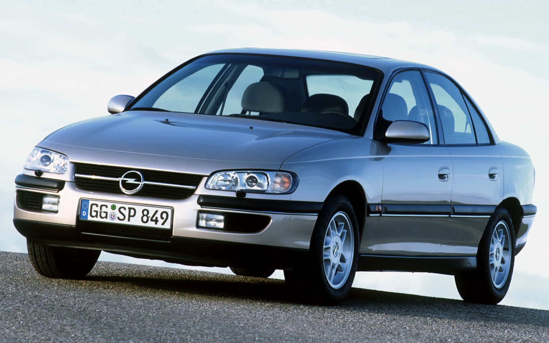 1920x1200 Download Stunning Opel Omega Cruising on the Open Road Wallpaper