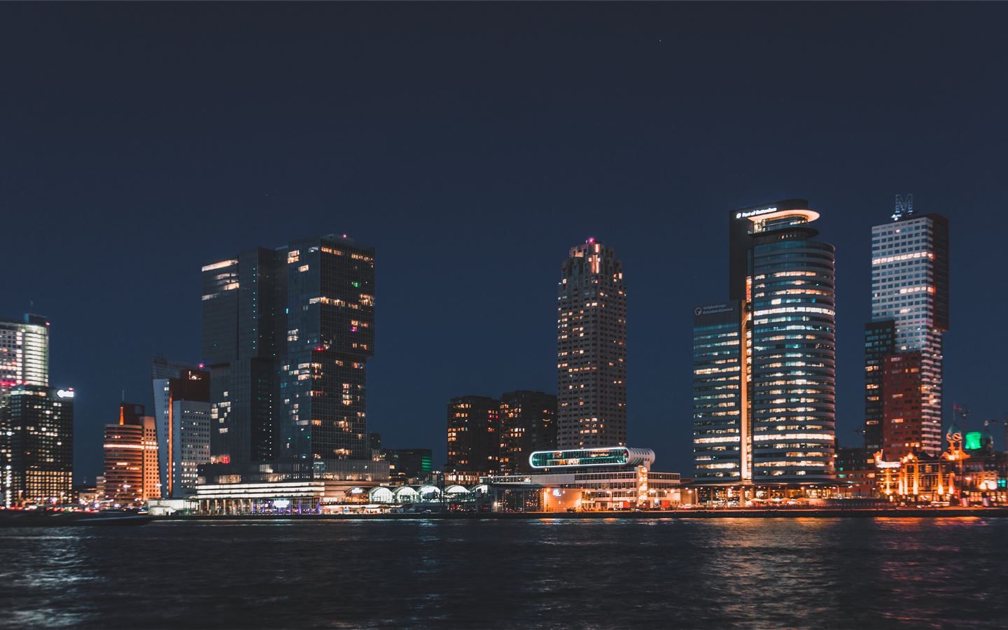 1440x900 city skyline during night time MacBook Air Wallpaper Download