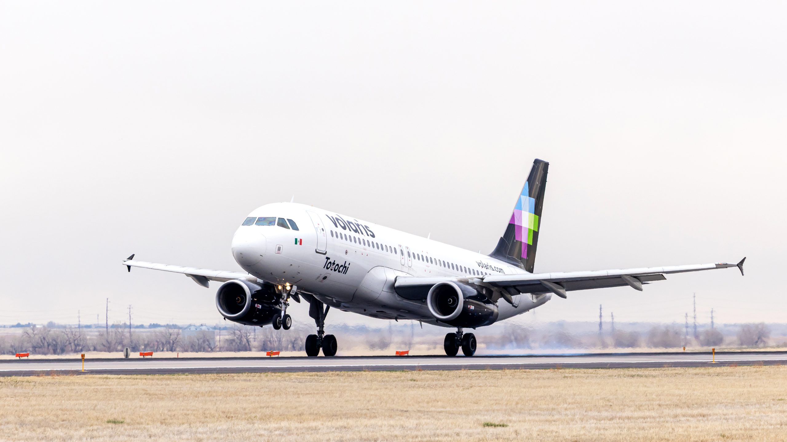 2560x1440 DEN Celebrates Expanded Service by Volaris. Denver International Airport