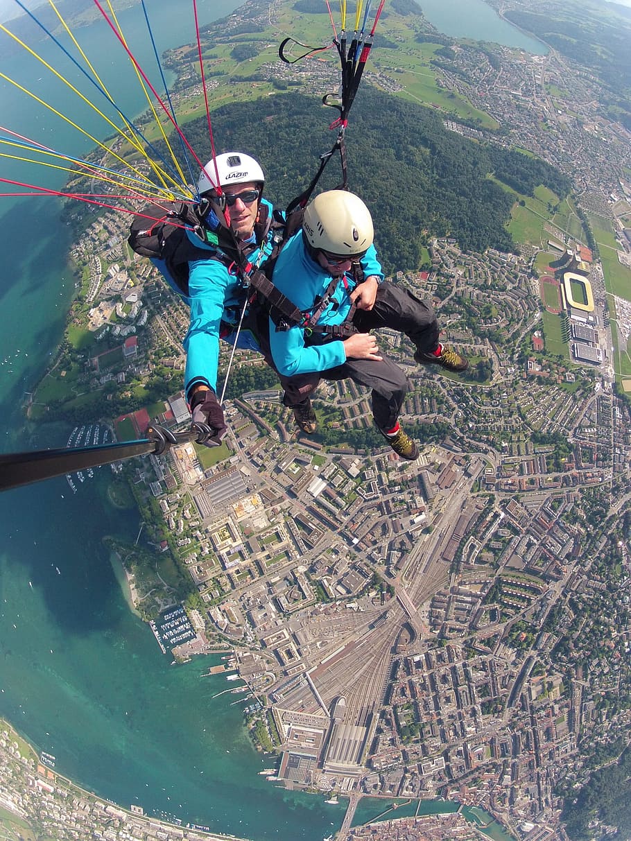 910x1213 HD wallpaper: two person riding sky diving on parachute, volaris paragliding