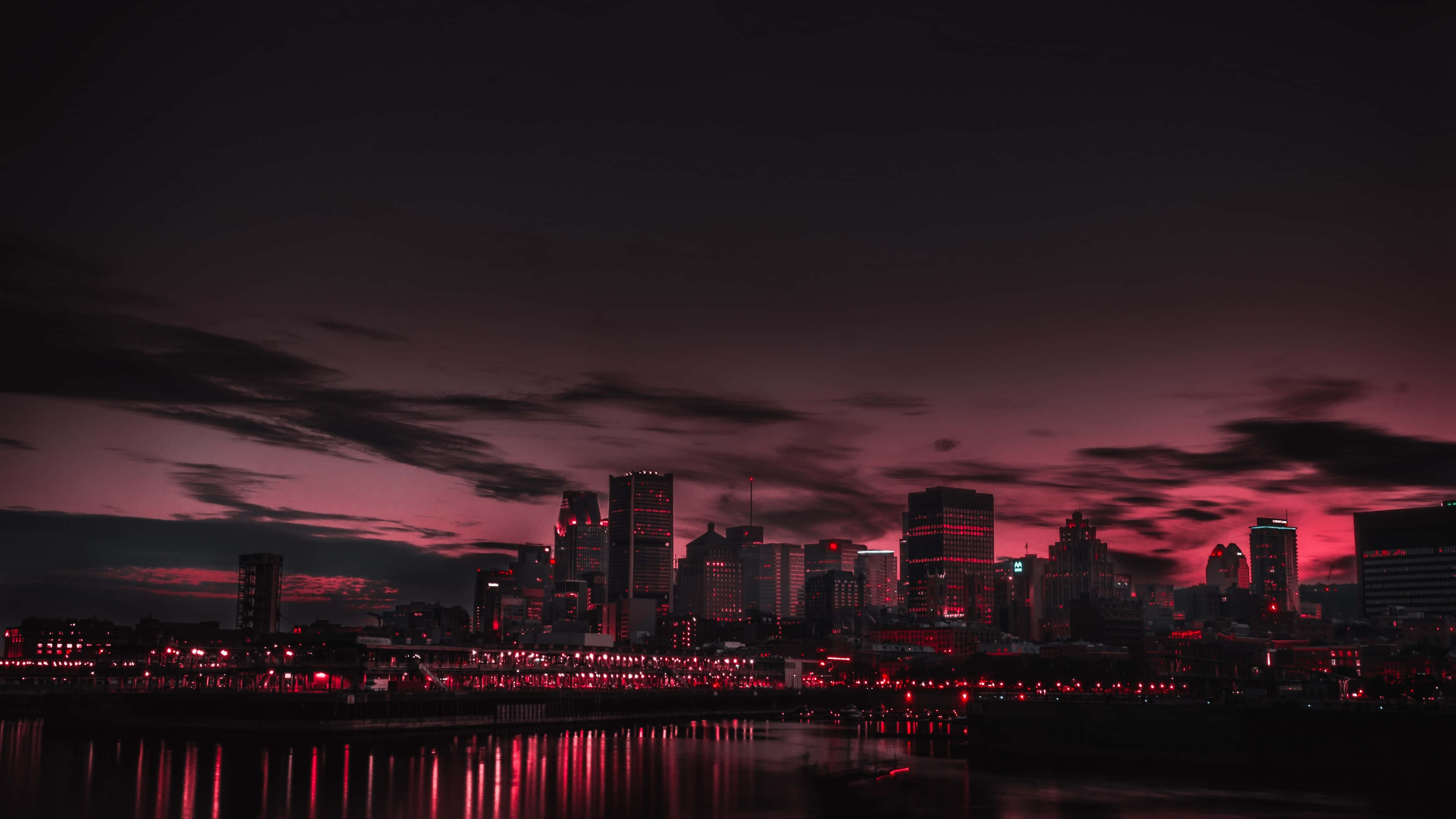 3840x2160 Download a city skyline with red lights Background