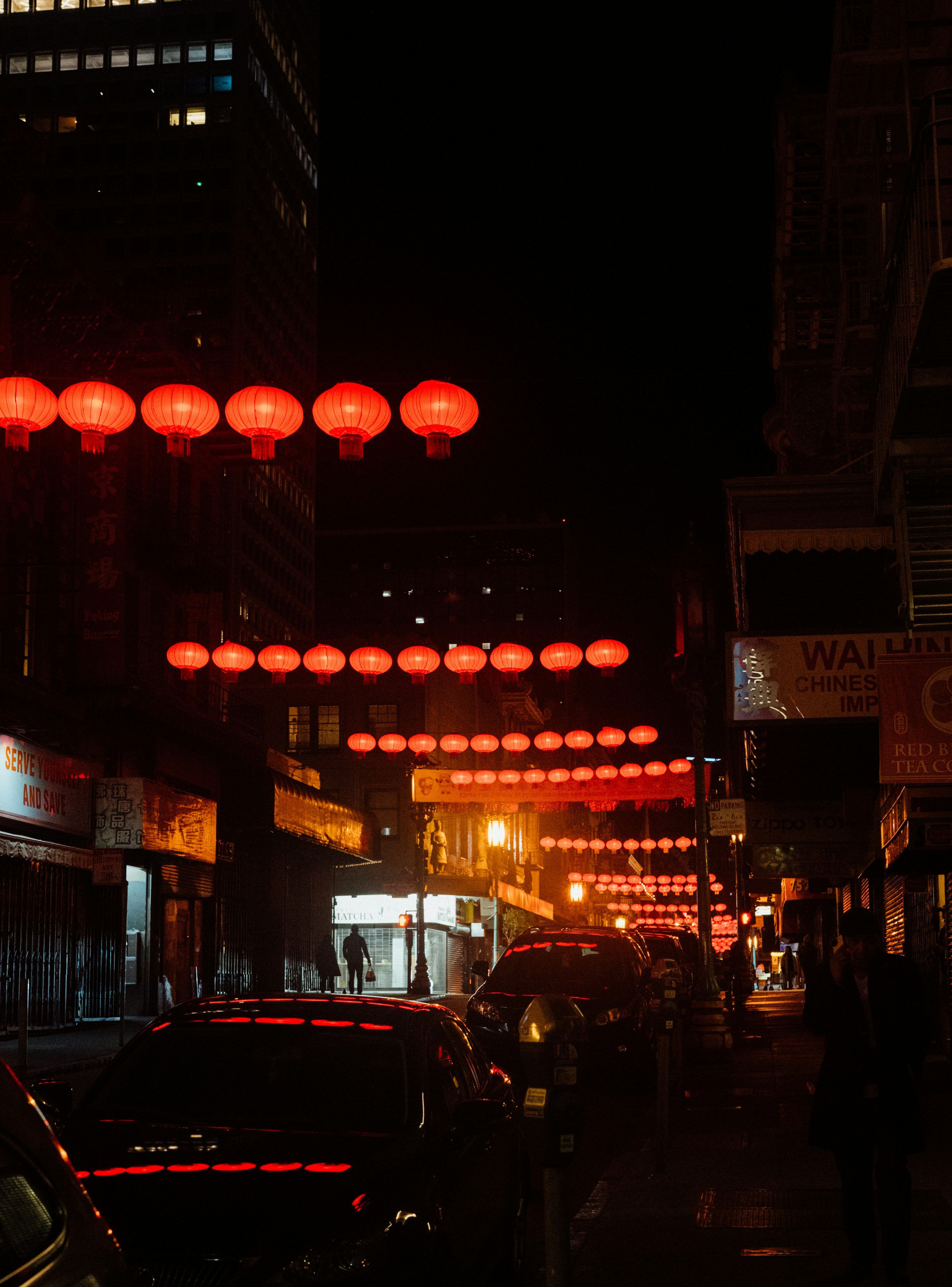 3000x4054 A city street at night with red lights