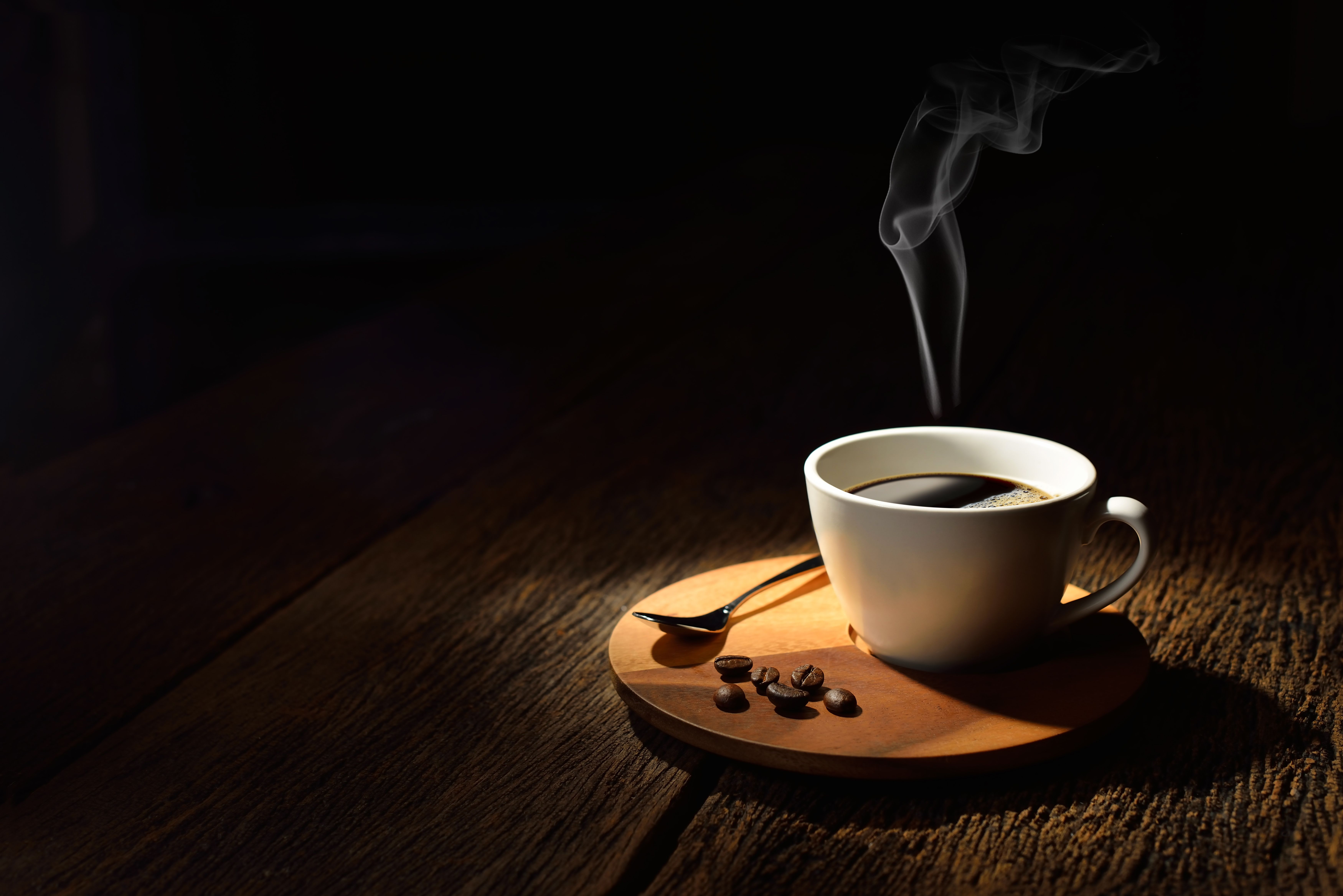 7000x4672 4K Ultra HD Still Life: Steaming Coffee Cup with Beans and Spoonx4672
