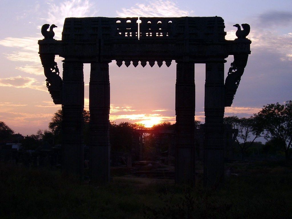 1024x768 Warangal Fort Kakateeya Thoranam East Gate SunSet. Warangal