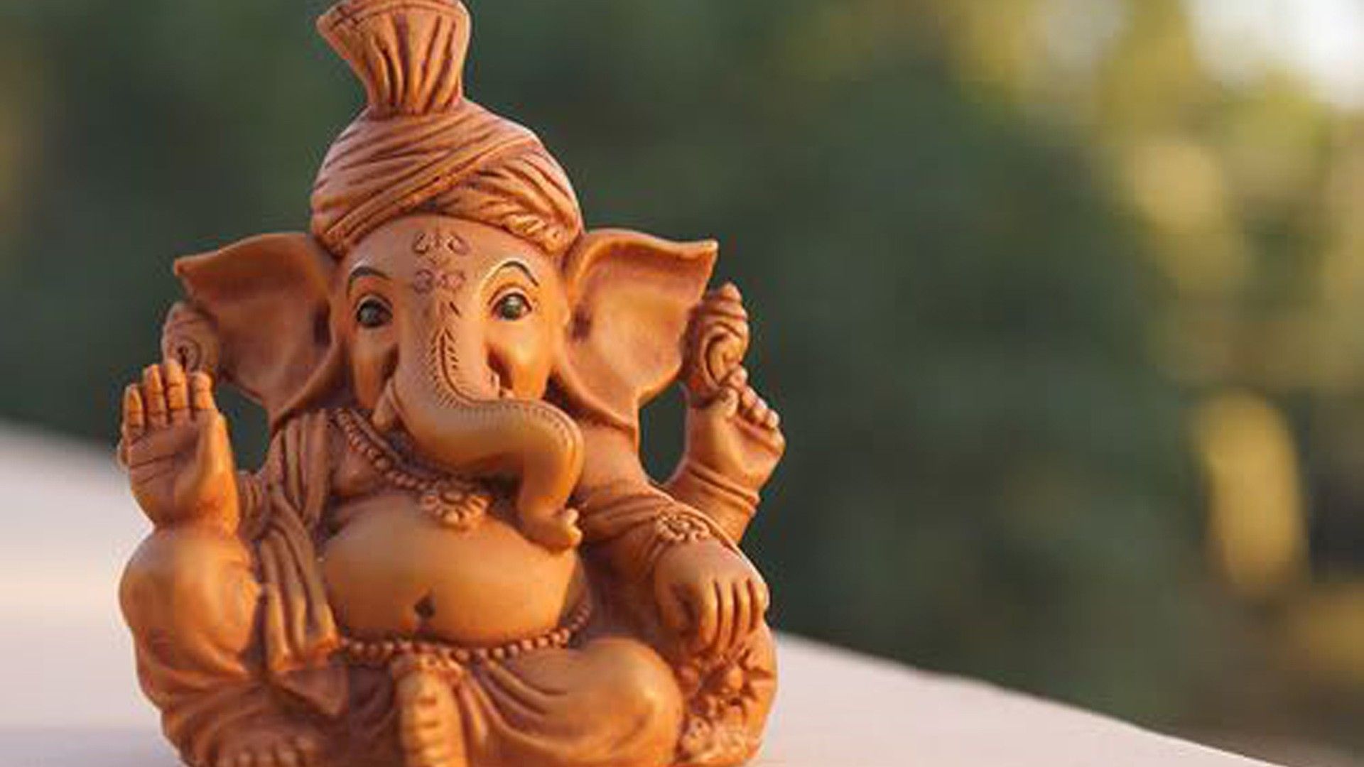 1920x1080 Cute Ganesh Wood Statue In Blur Background HD Cute Wallpaper