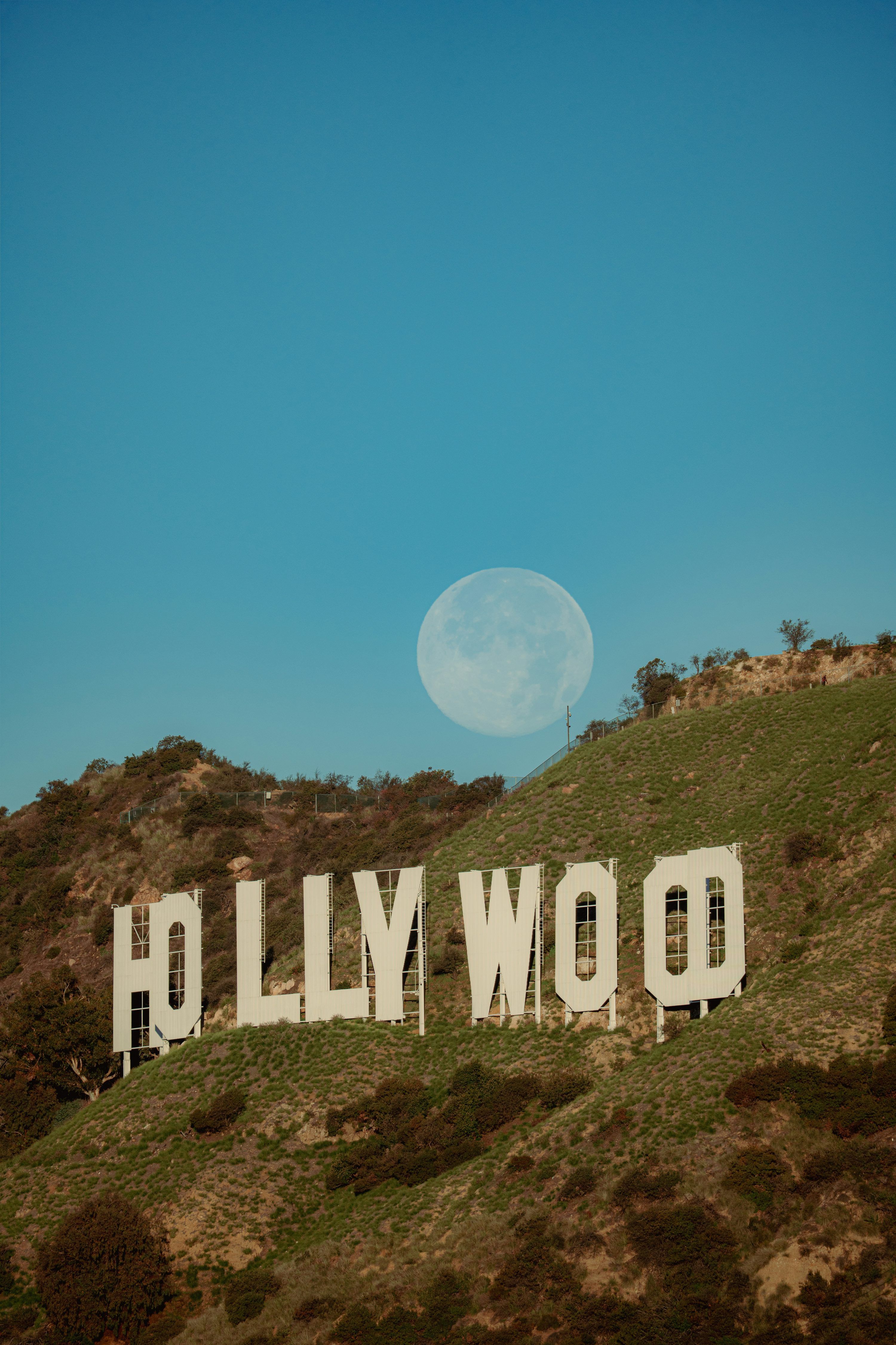 3000x4500 Hollywood sign with full moon in clear sky