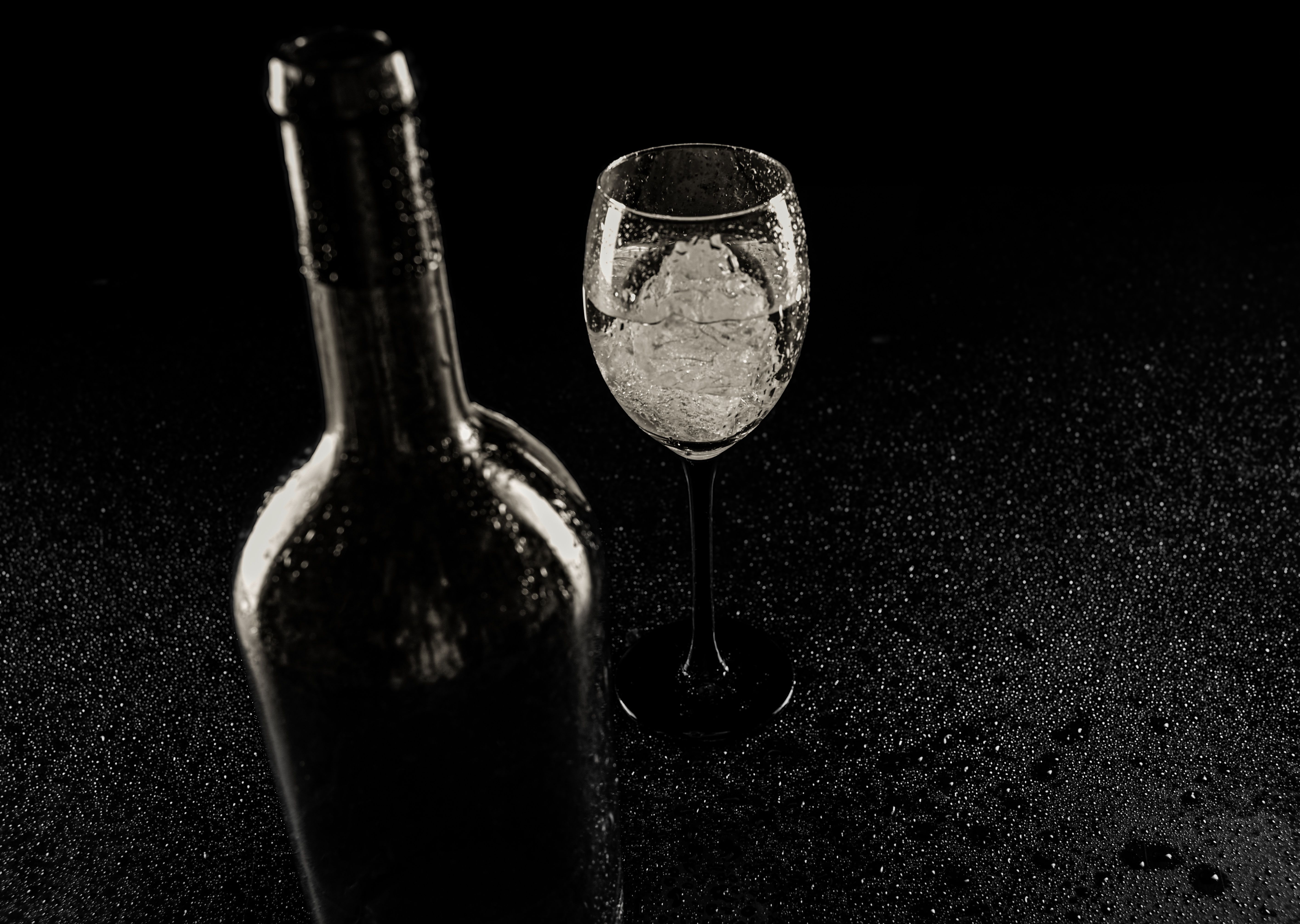 5659x4024 Moody Black and White Wine Bottle and Glass Still Life · Free