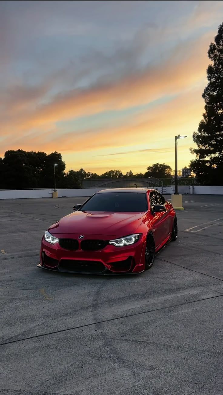 736x1306 BMW M4 Red sunset wallpaper