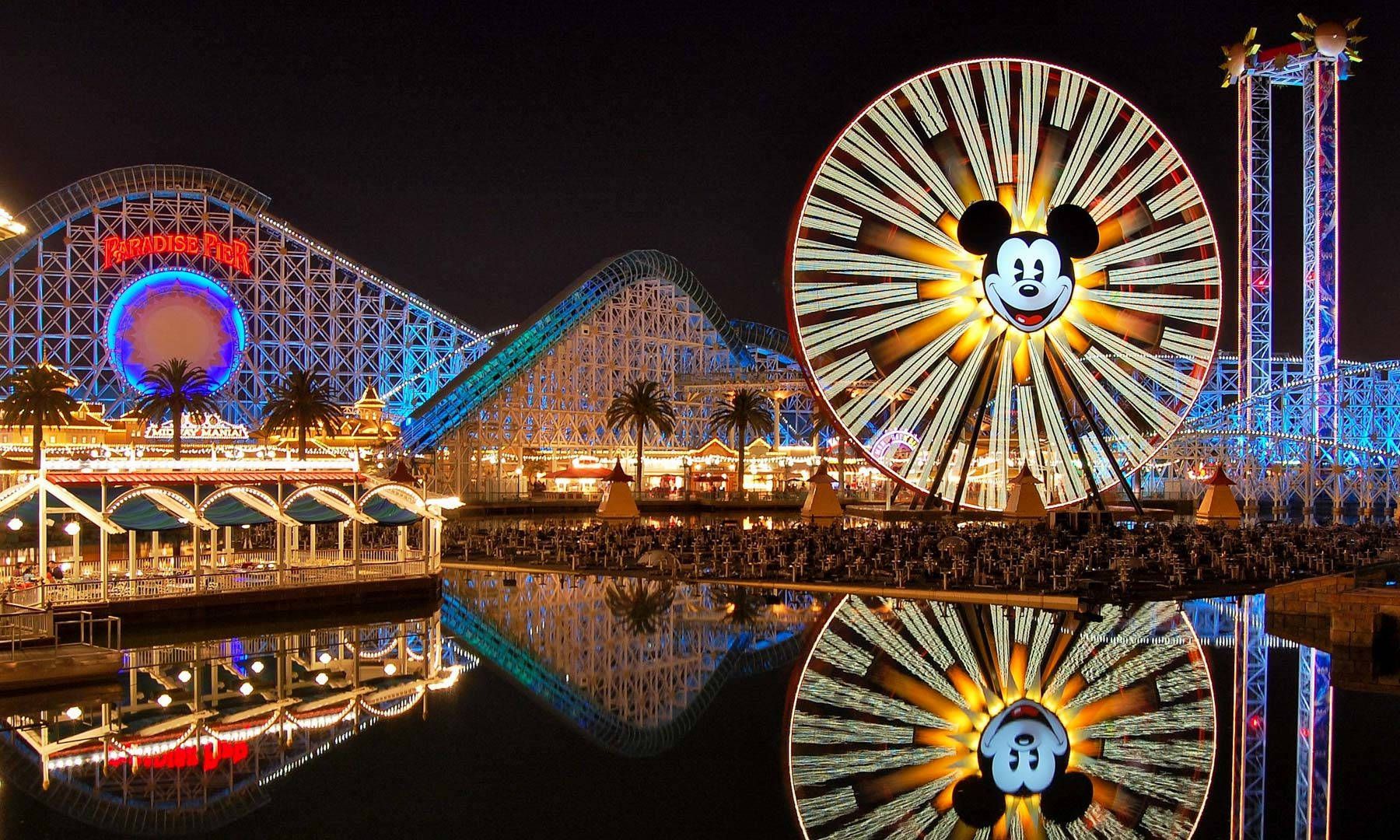 1800x1080 Download Enjoy the Magical View of Pixar Pier at Night Wallpaper