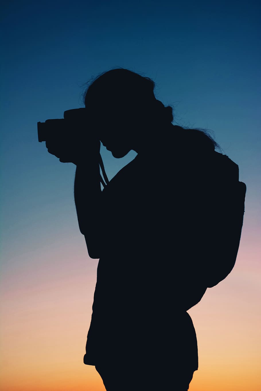 910x1365 HD wallpaper: Silhouette of Person Taking Photo With Camera, art, HD wallpaper