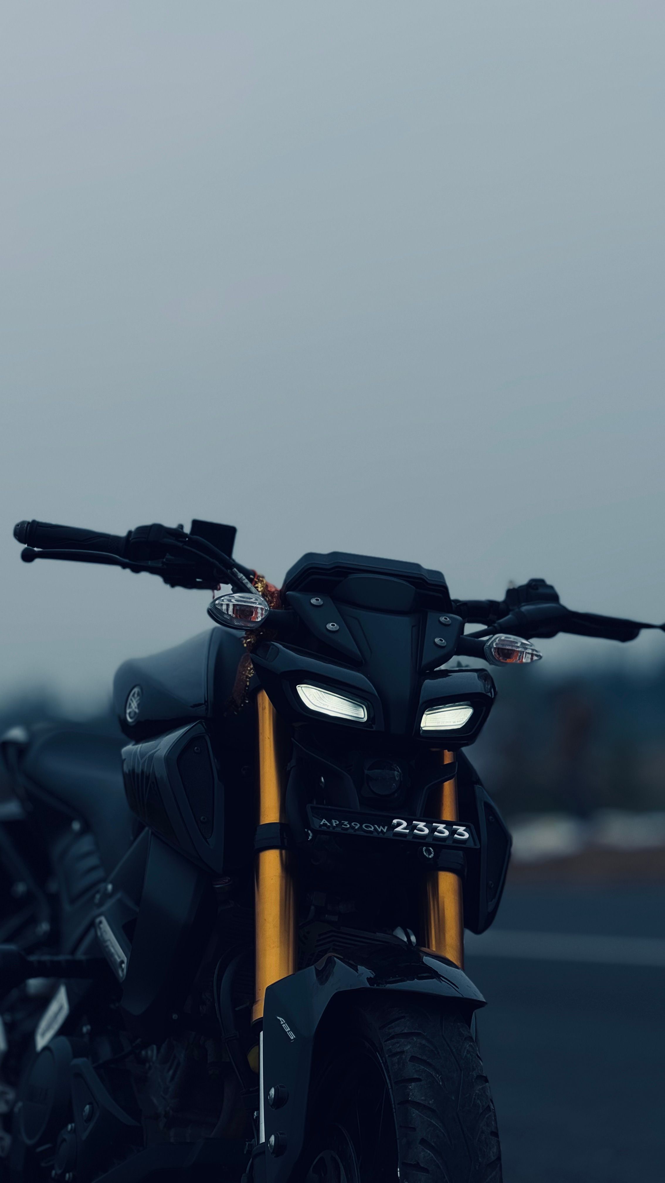 2268x4032 Black Naked Bike with Shining Headlights · Free