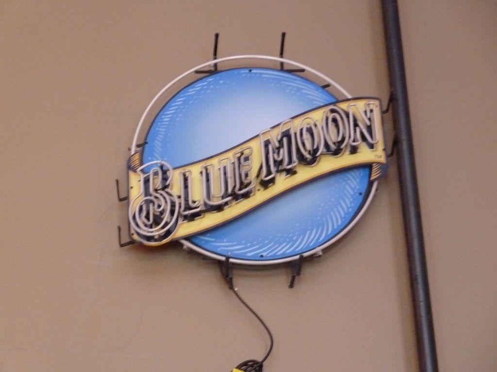 1024x768 An unlit Blue Moon beer sign inside Hooters in Sacramento