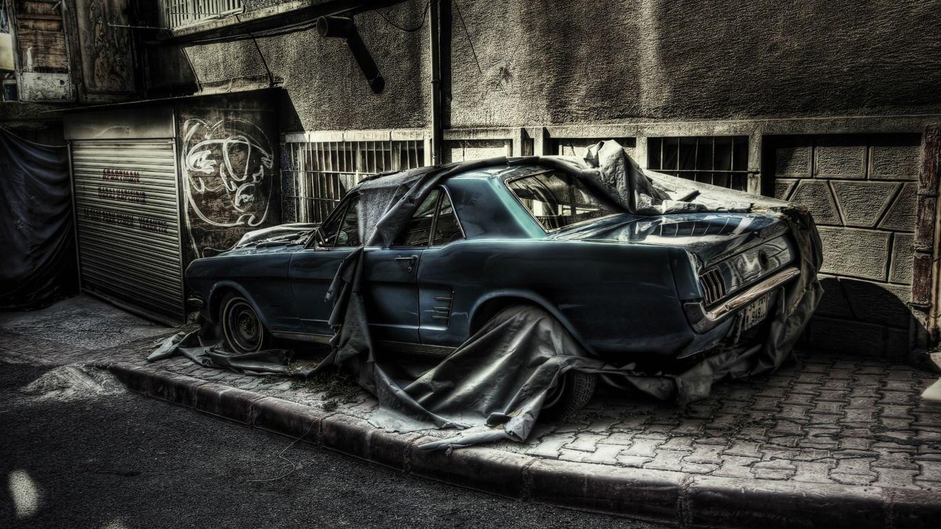 1366x768 Abandoned car on a city street, photo HDR Desktop wallpaper 1366x768