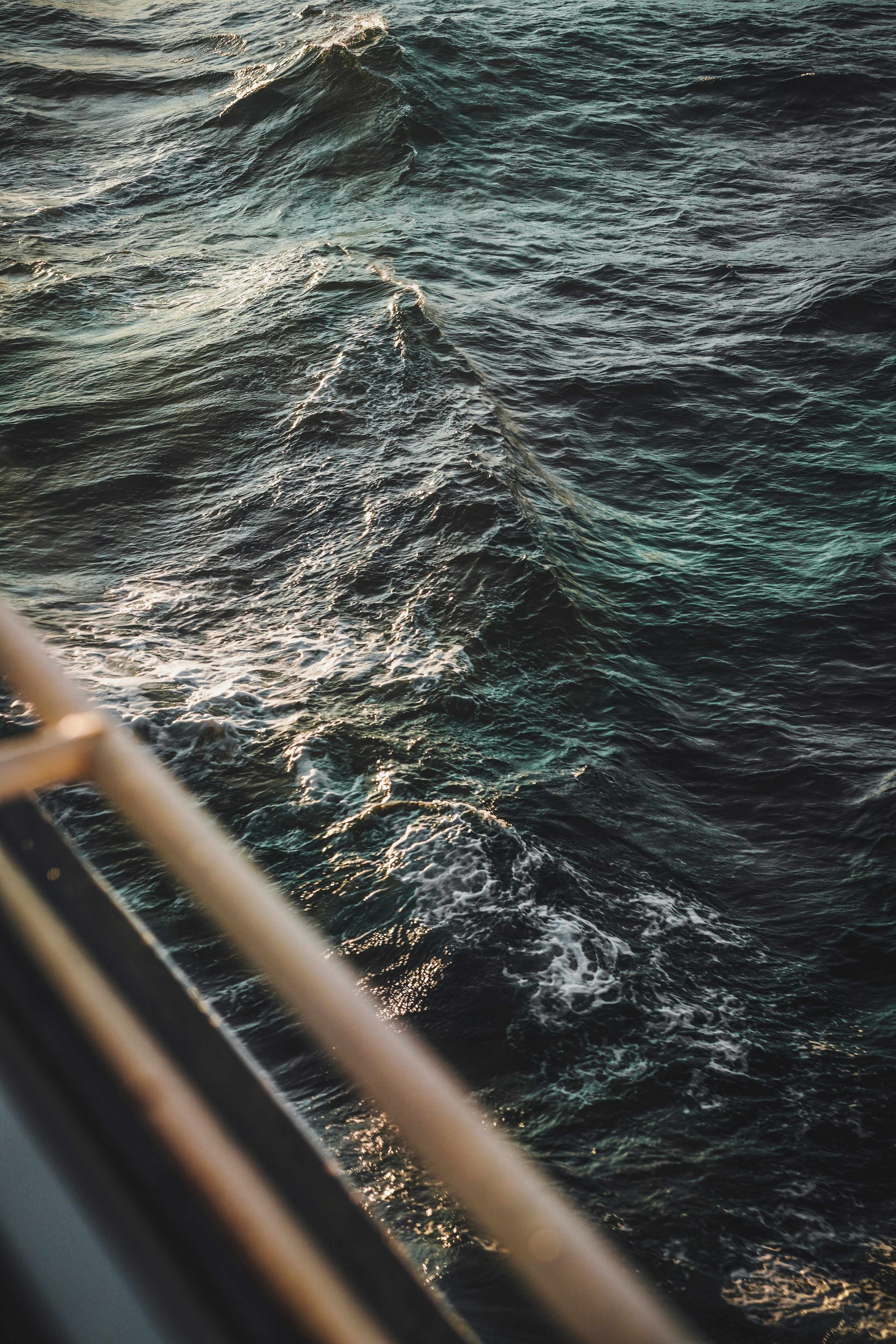3000x4500 Rough ocean waves seen from a ship's railing