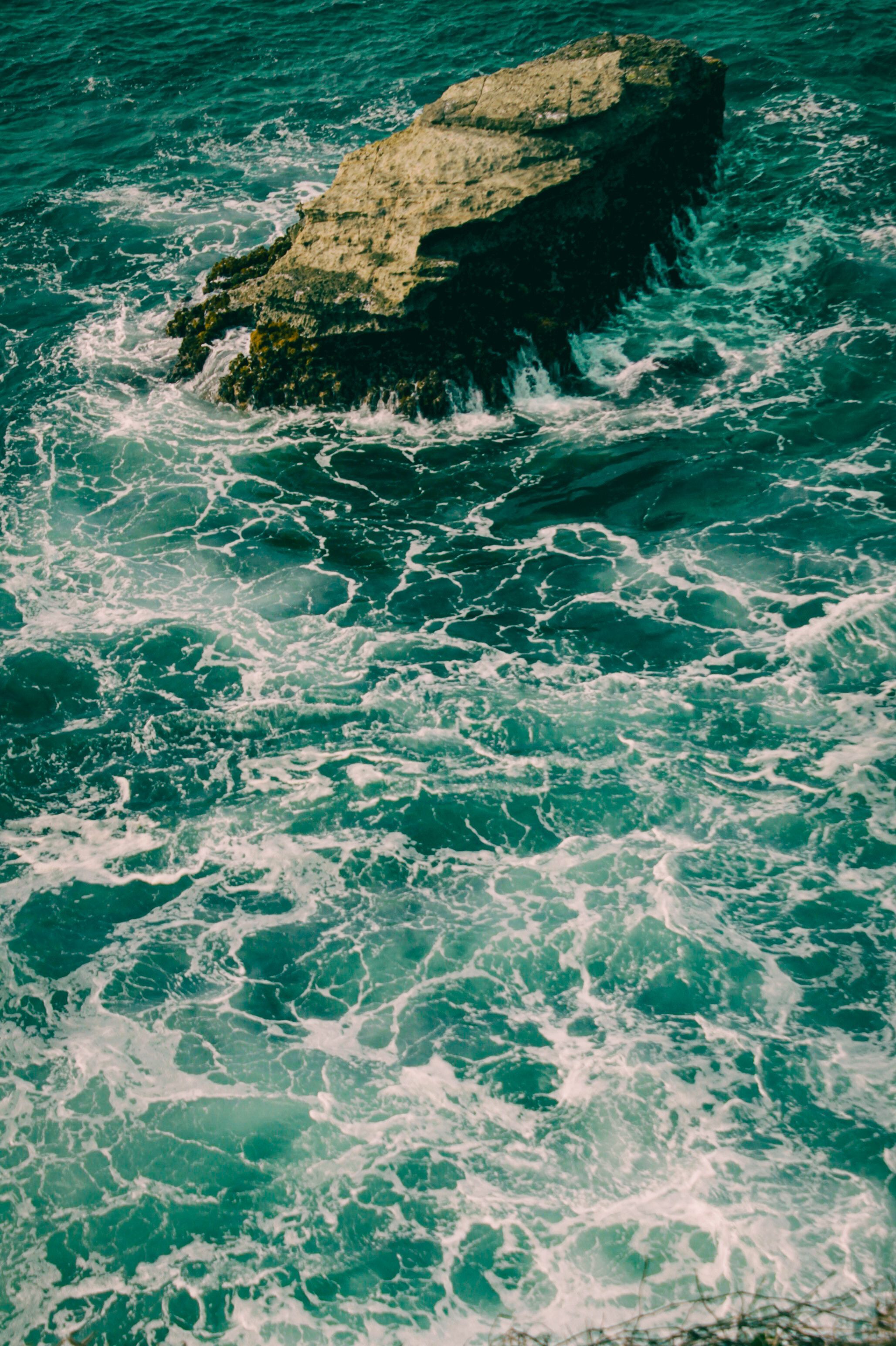 2056x3088 Rough Sea and a Rock · Free