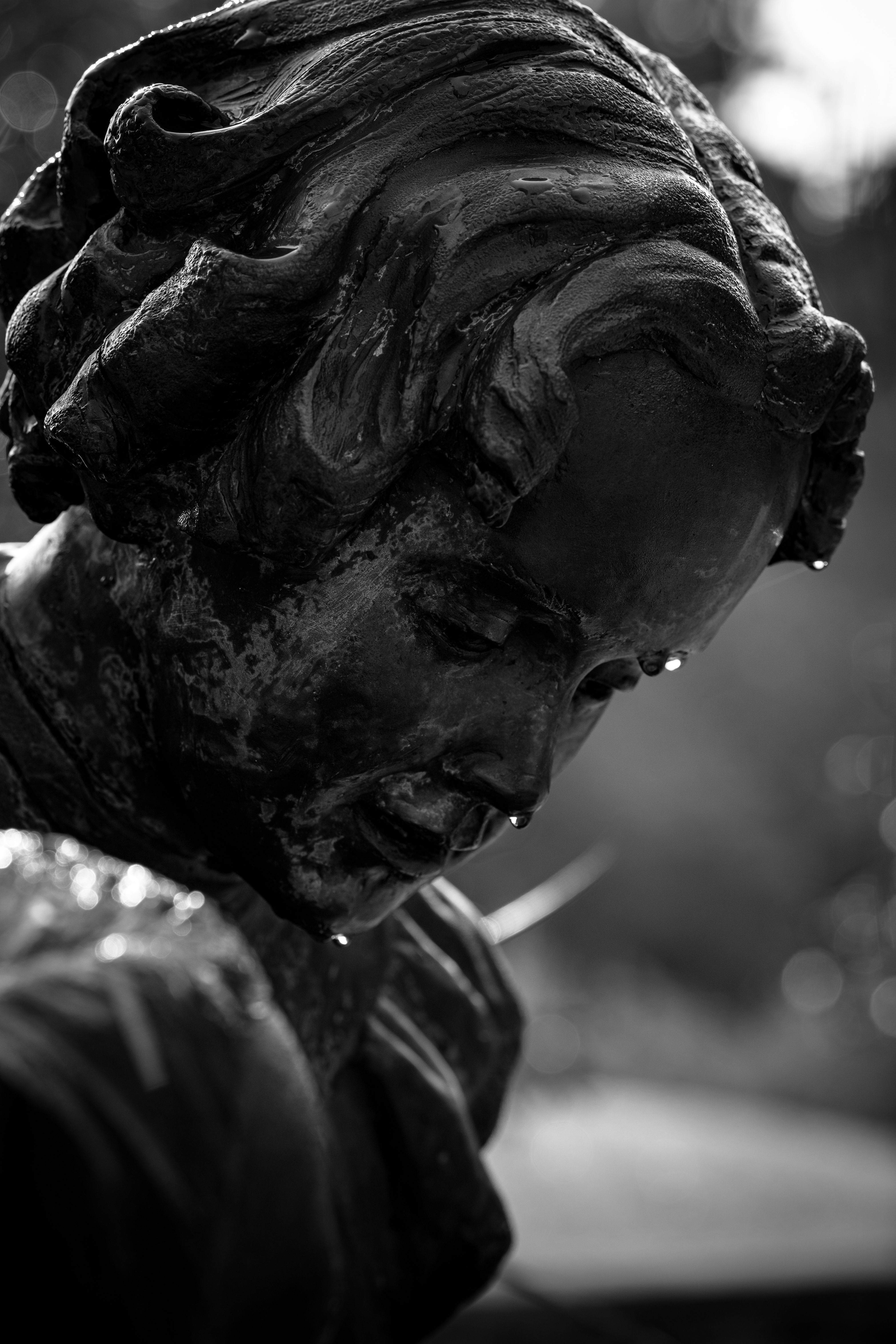 4032x6048 Contemplative Bronze Sculpture in Black and White · Free