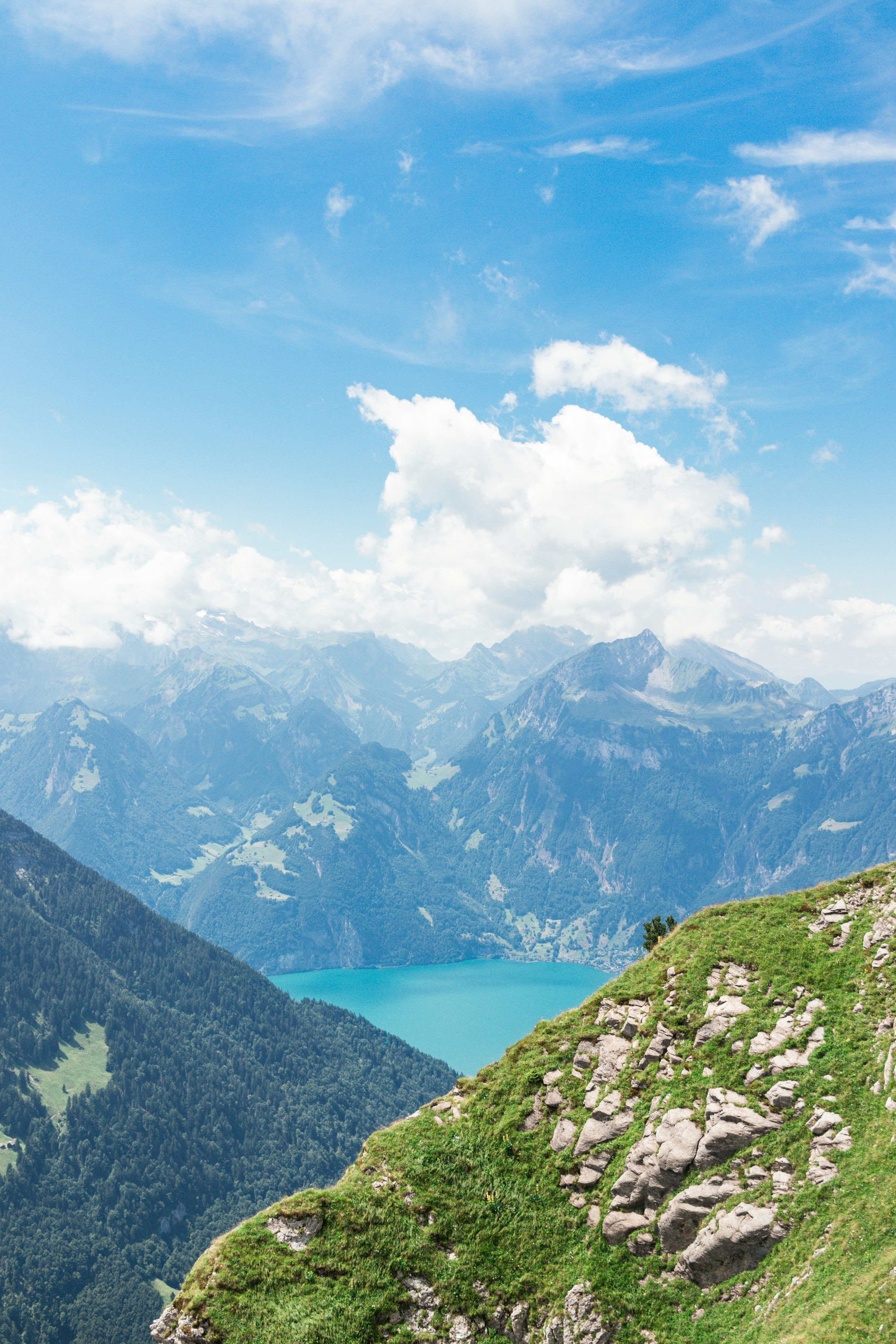 3000x4500 Mountains and a lake under a bright blue sky