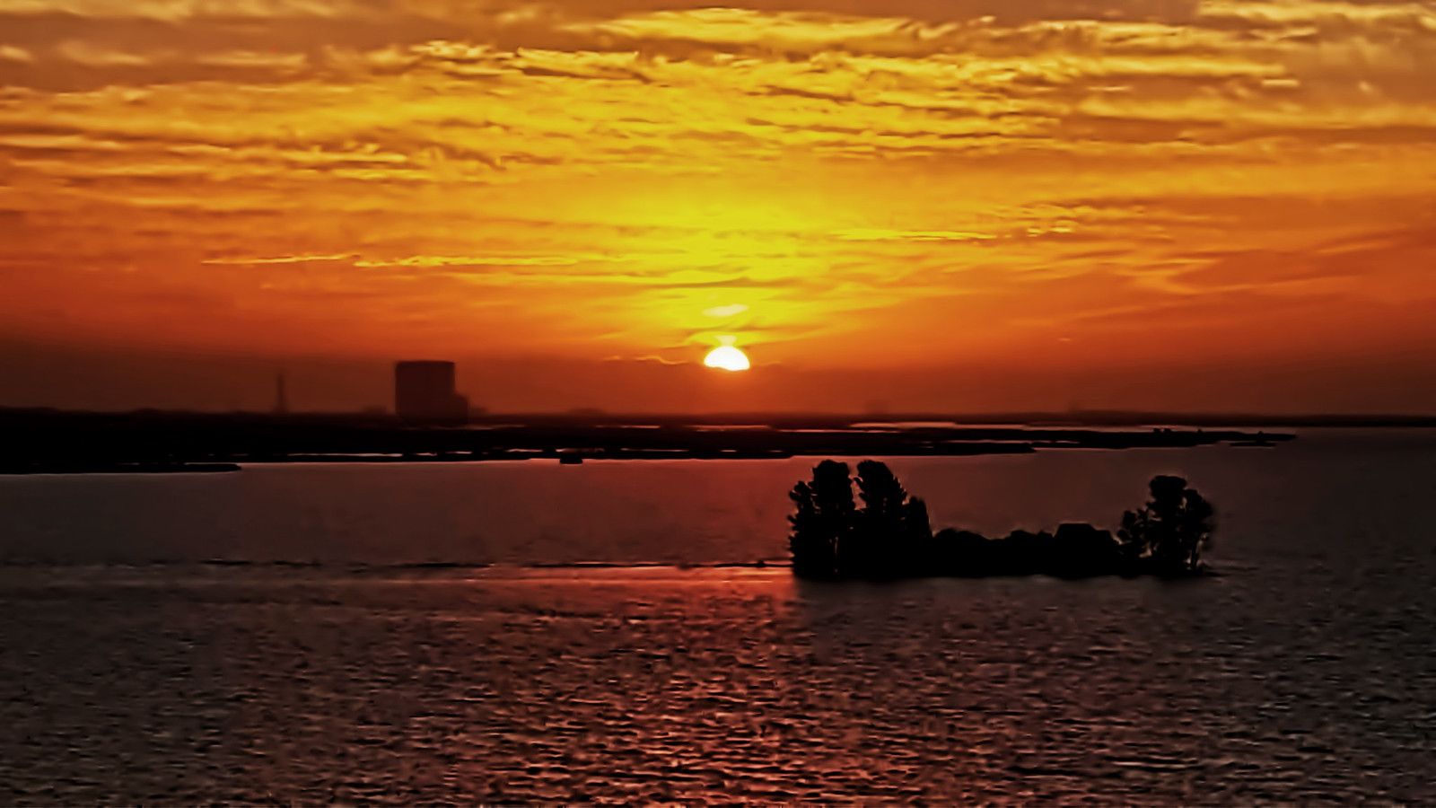 1600x900 Sunrise over the skyline of Cape Canaveral, Florida, U.S.A