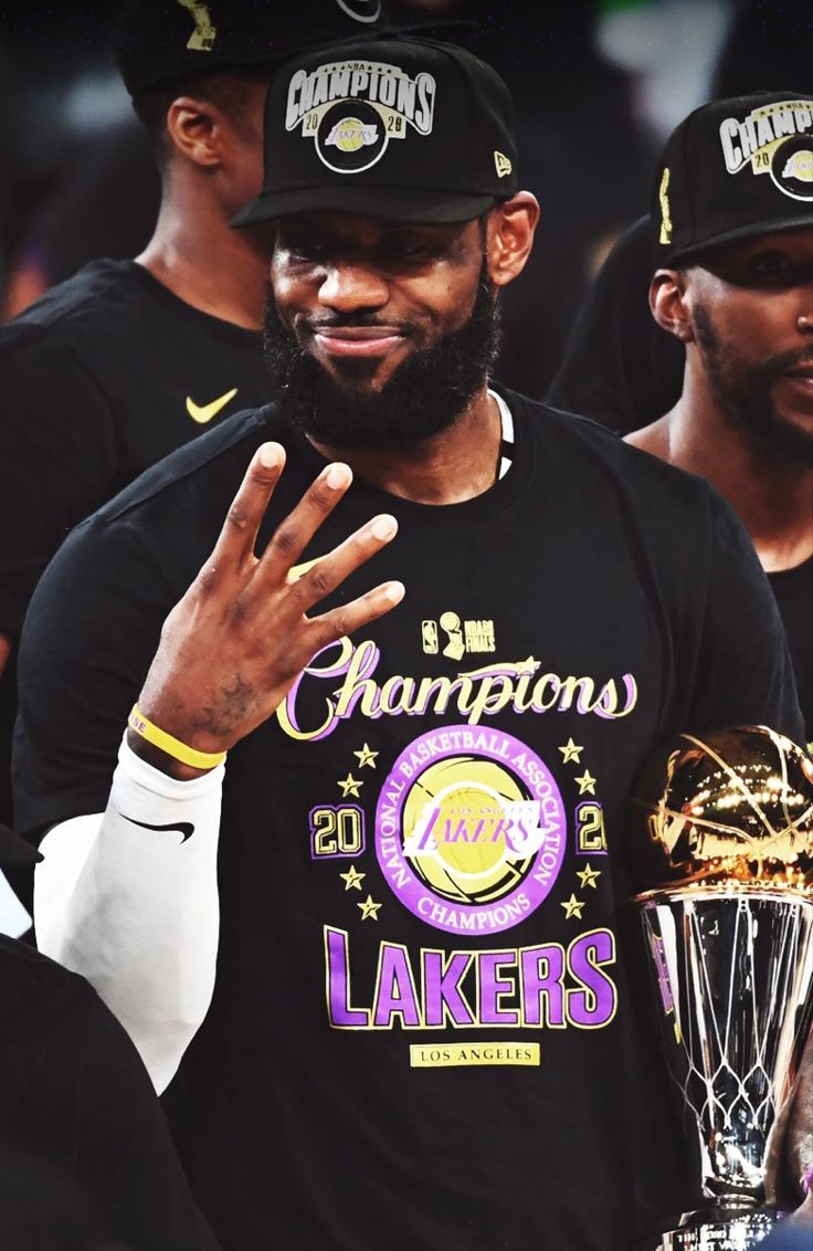 736x1132 NBA Power Rankings: Lakers Dominating the Court. Lebron james champ, Lebron holding trophies, Lebron