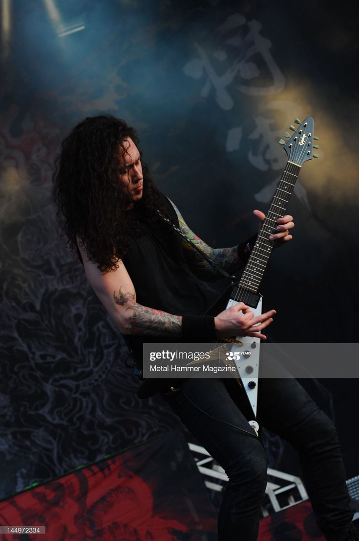 735x1105 Matt Heafy of Trivium performs live on stage at Download Festival