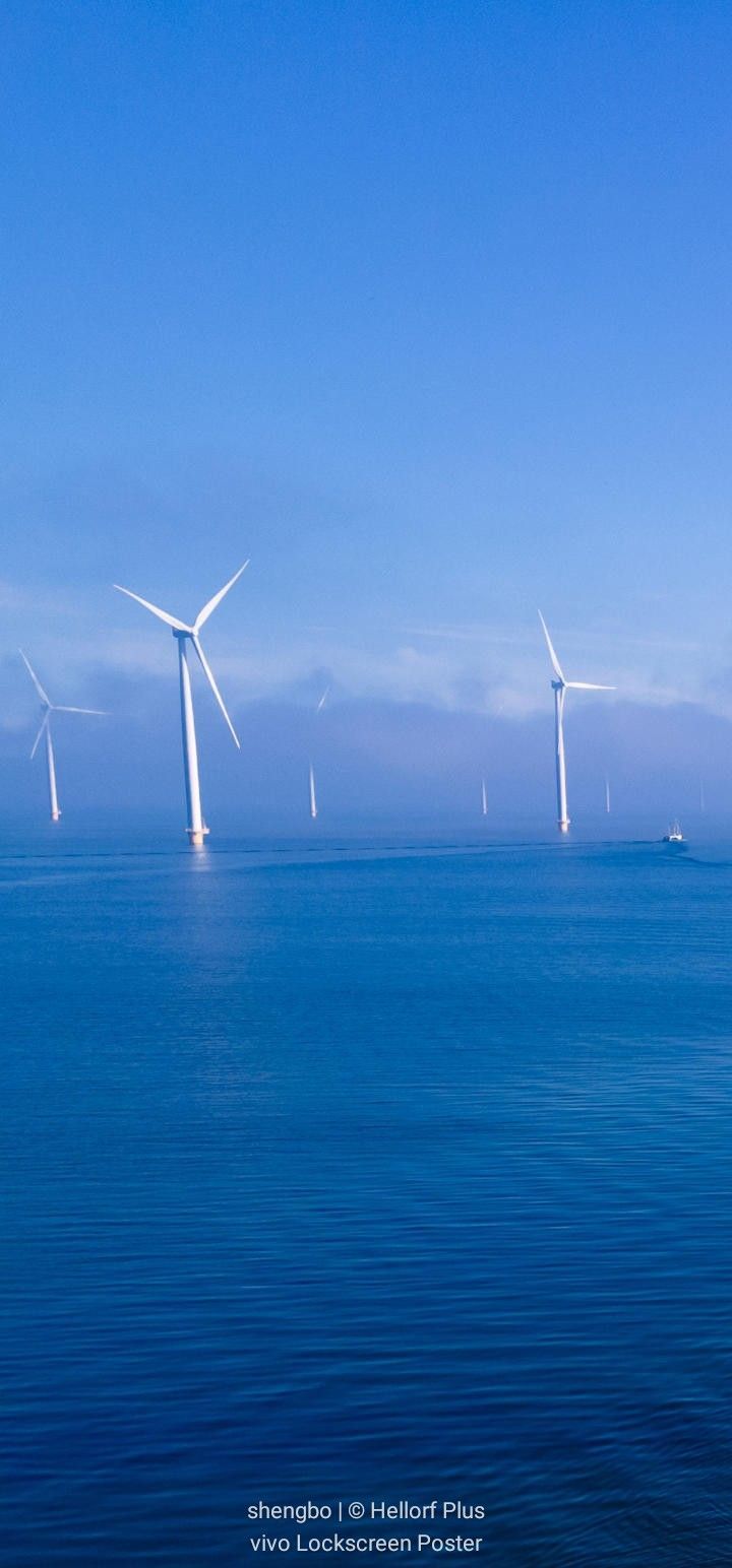 720x1544 Ocean Wind Turbines Wallpaper. Clothespins in a turquoise blue sky wallpaper, Windmills on blue water, Blue windmill wallpaper