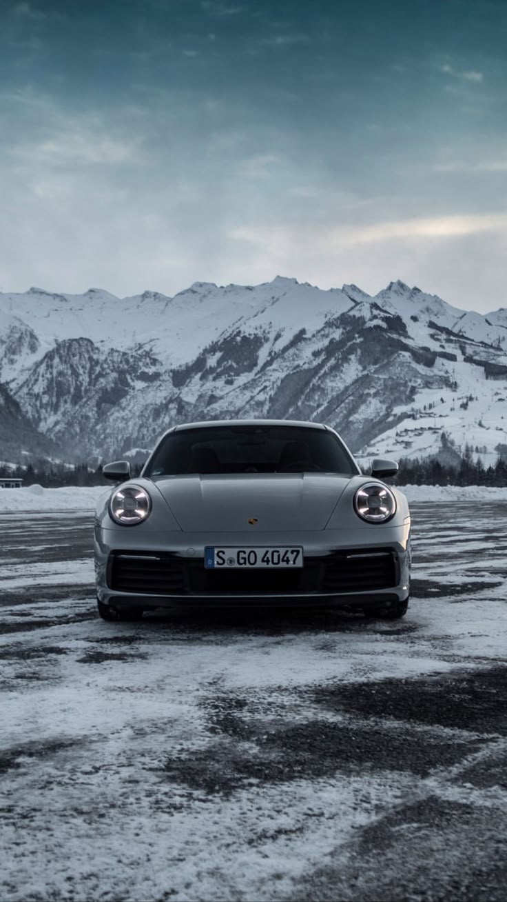 736x1308 Porsche Panamera Winter Wallpaper