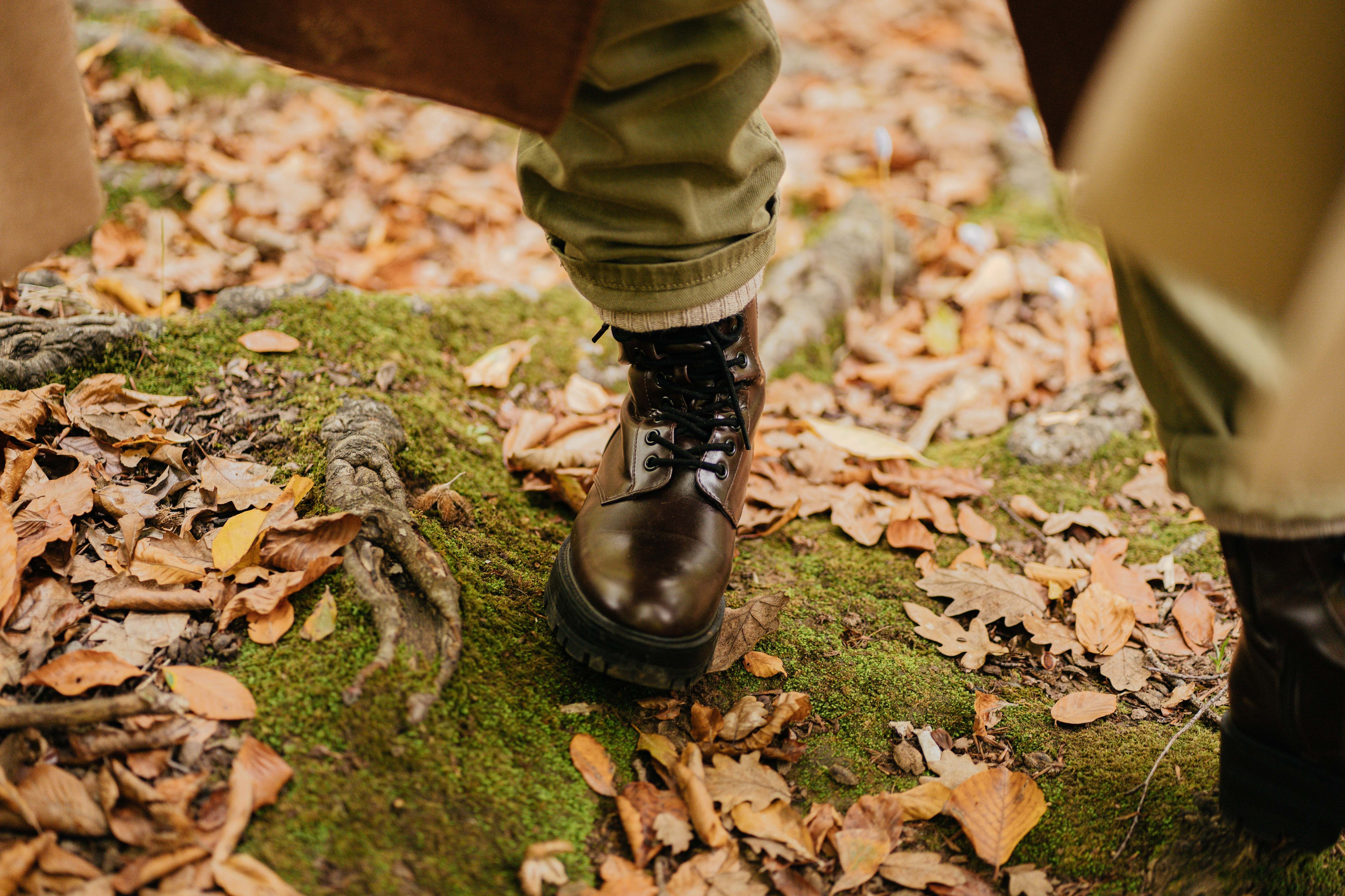 6000x4000 Leather boot of Man Sitting in Forest · Free