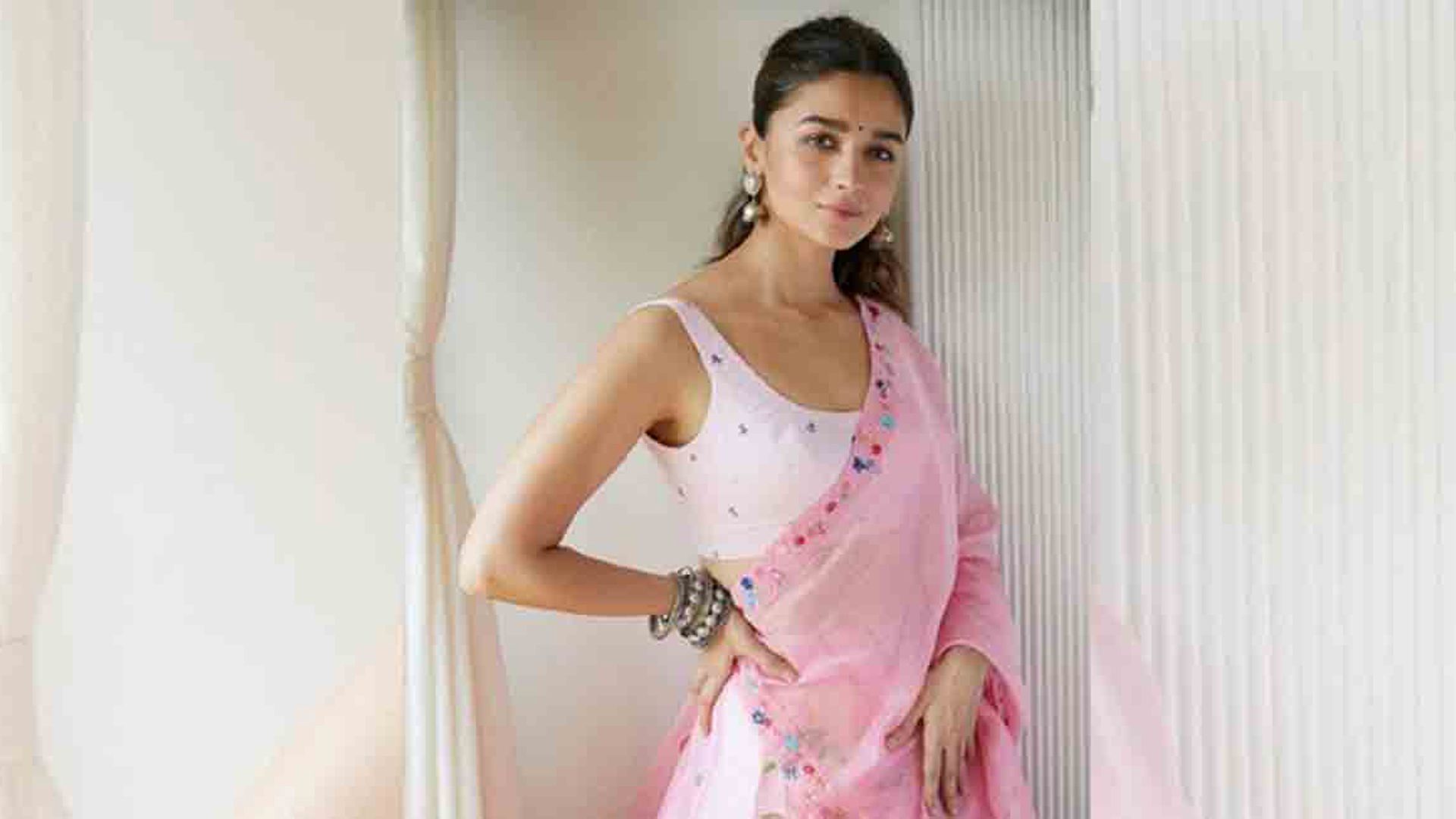 1920x1080 Beautiful Actress Alia Bhatt Is Standing In White Wall Background Wearing Light Pink Saree HD Girls Wallpaper