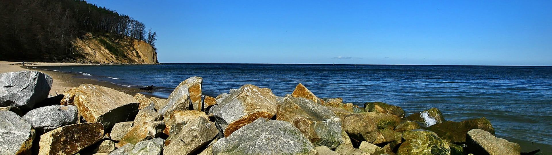 1920x540 Sunny handy rock beach wallpaper