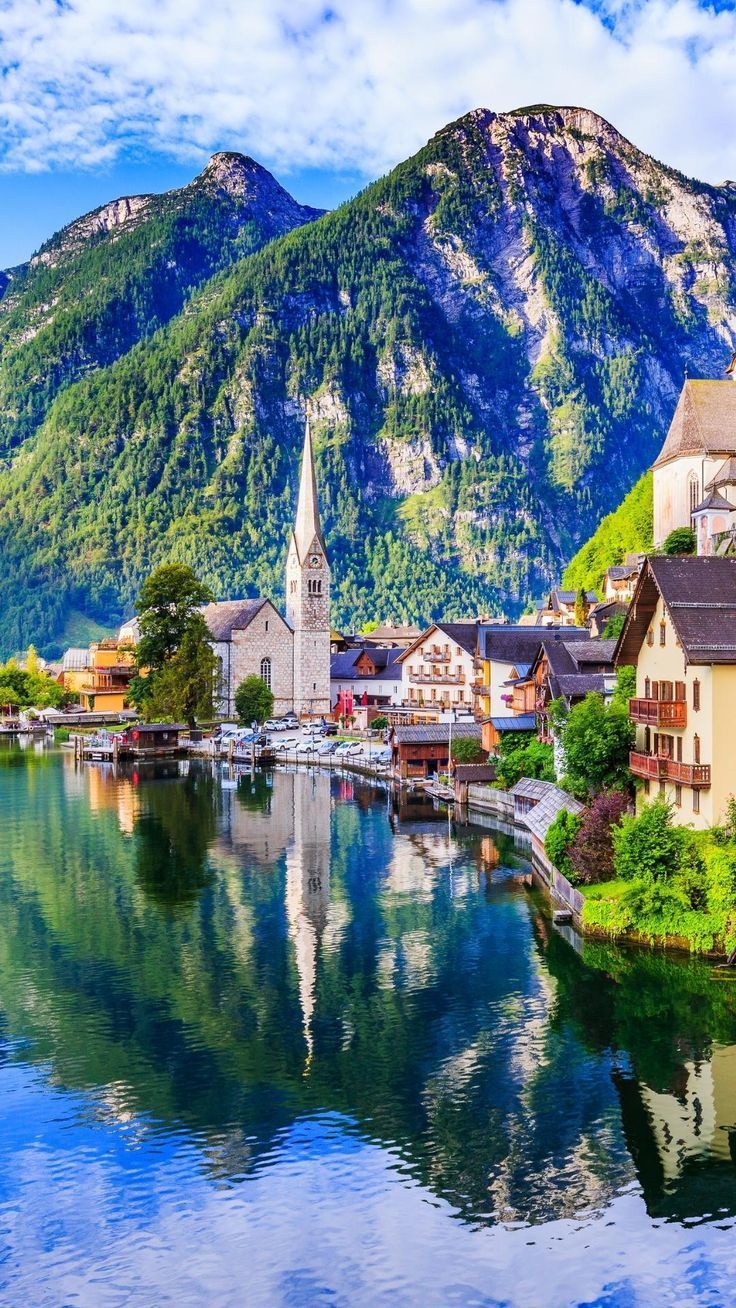 736x1308 Hallstatt, Austria. Alpine village wallpaper hd, Most beautiful villages in switzerland, Mountain village wallpaper hd