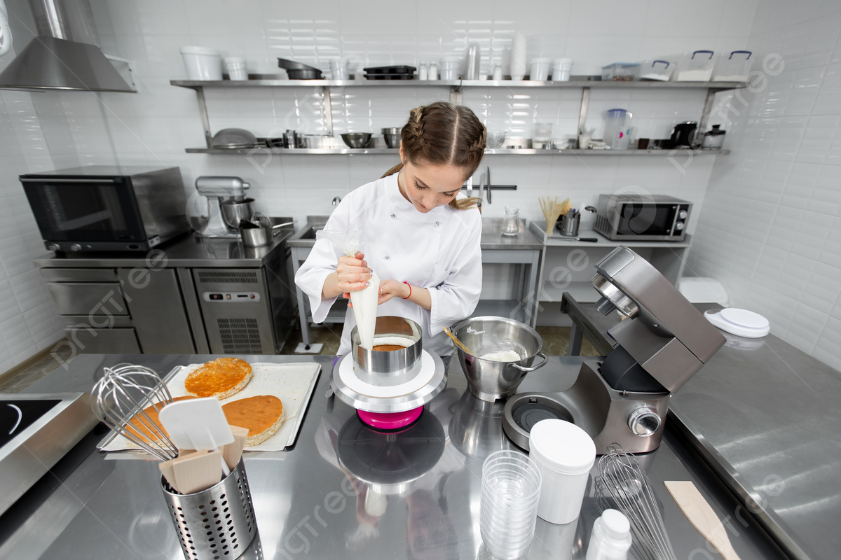 1200x800 A Pastry Chef Decorates A Cake With Cream Using A Pastry Bag Photo Background And Picture For Free Download