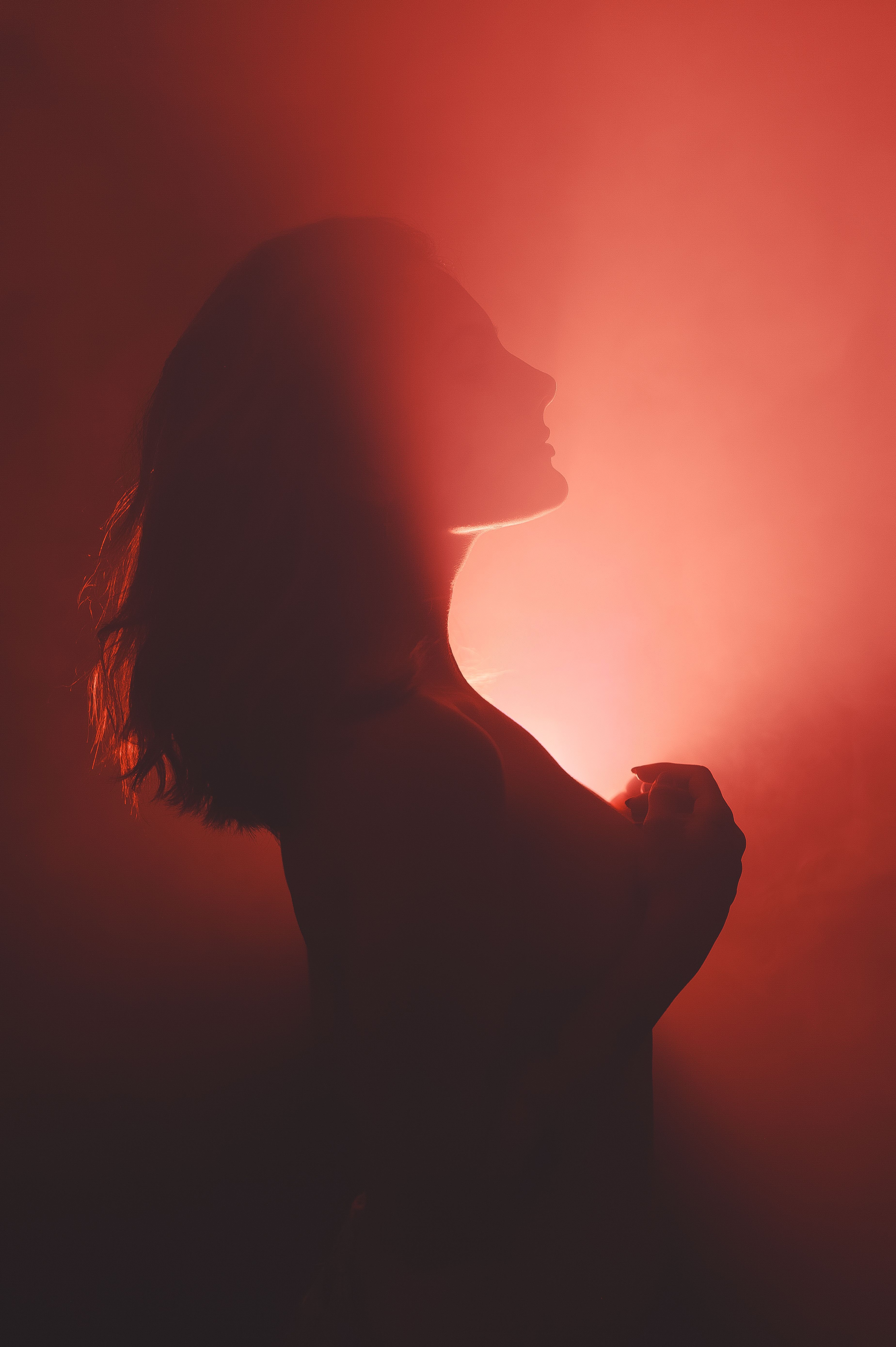 3697x5556 Woman in Red Light in the Dark · Free