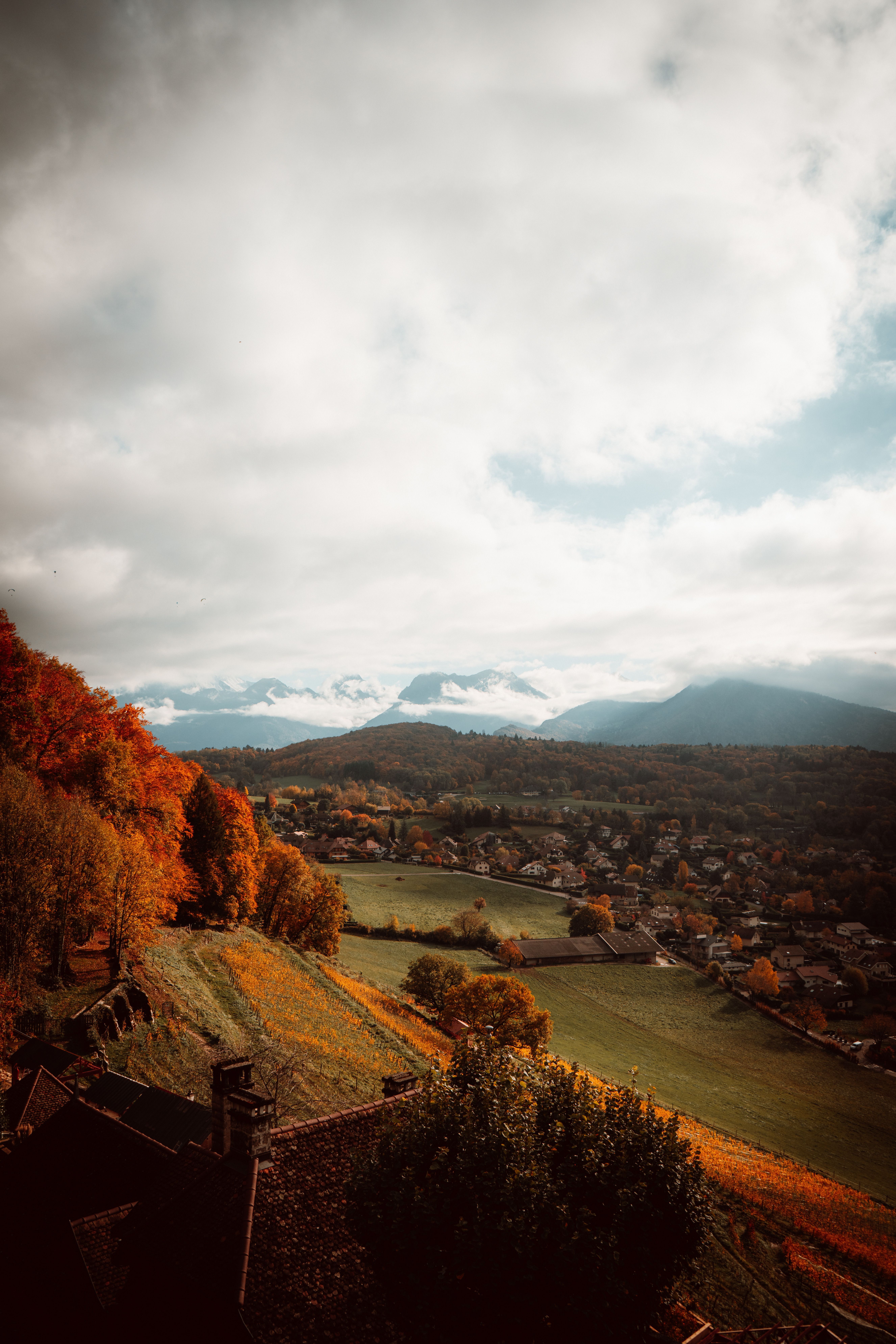 5304x7952 Charming Autumn Village Scene with Rustic Cottages · Free