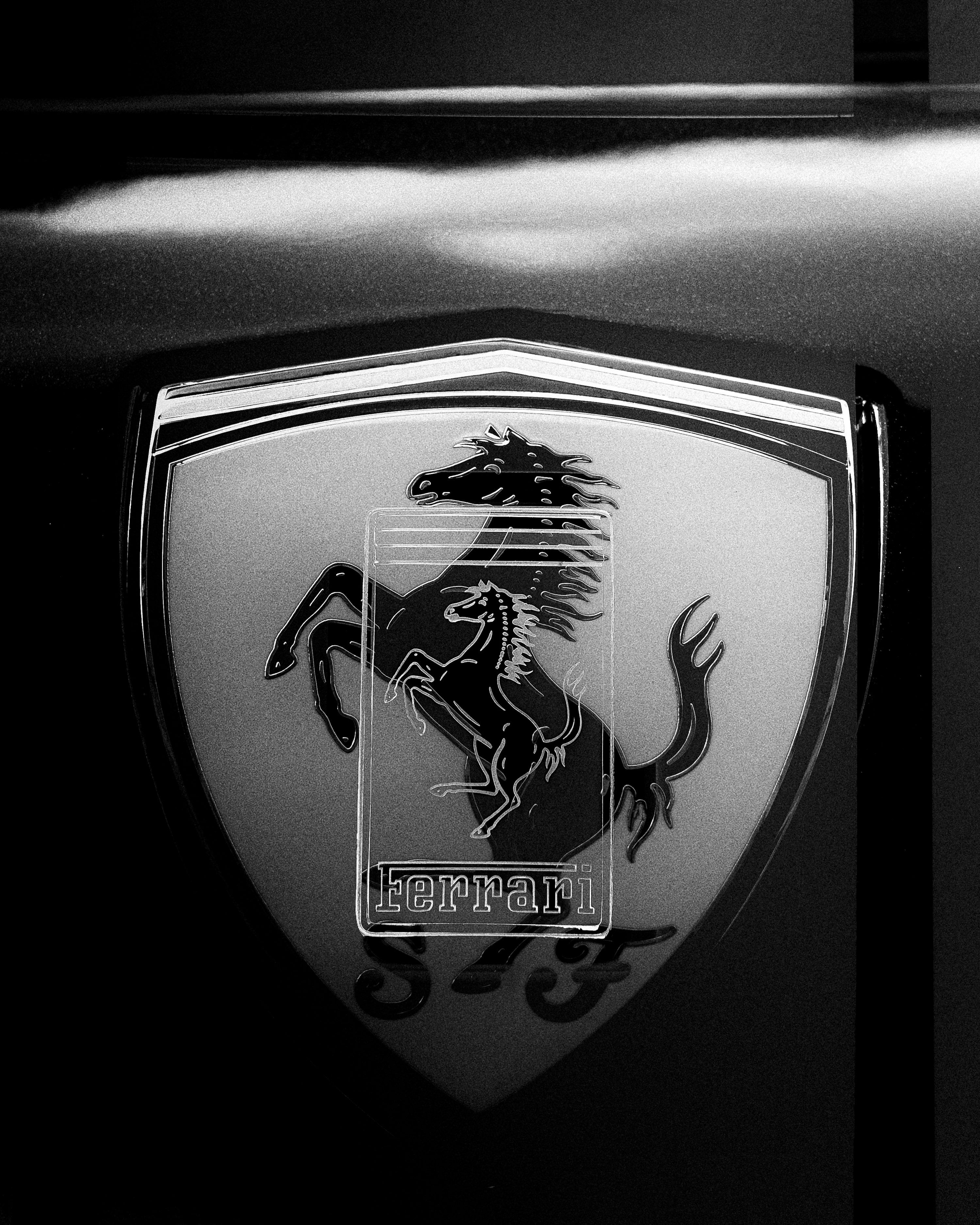 3000x3750 Close Up Of A Ferrari Emblem On A Car