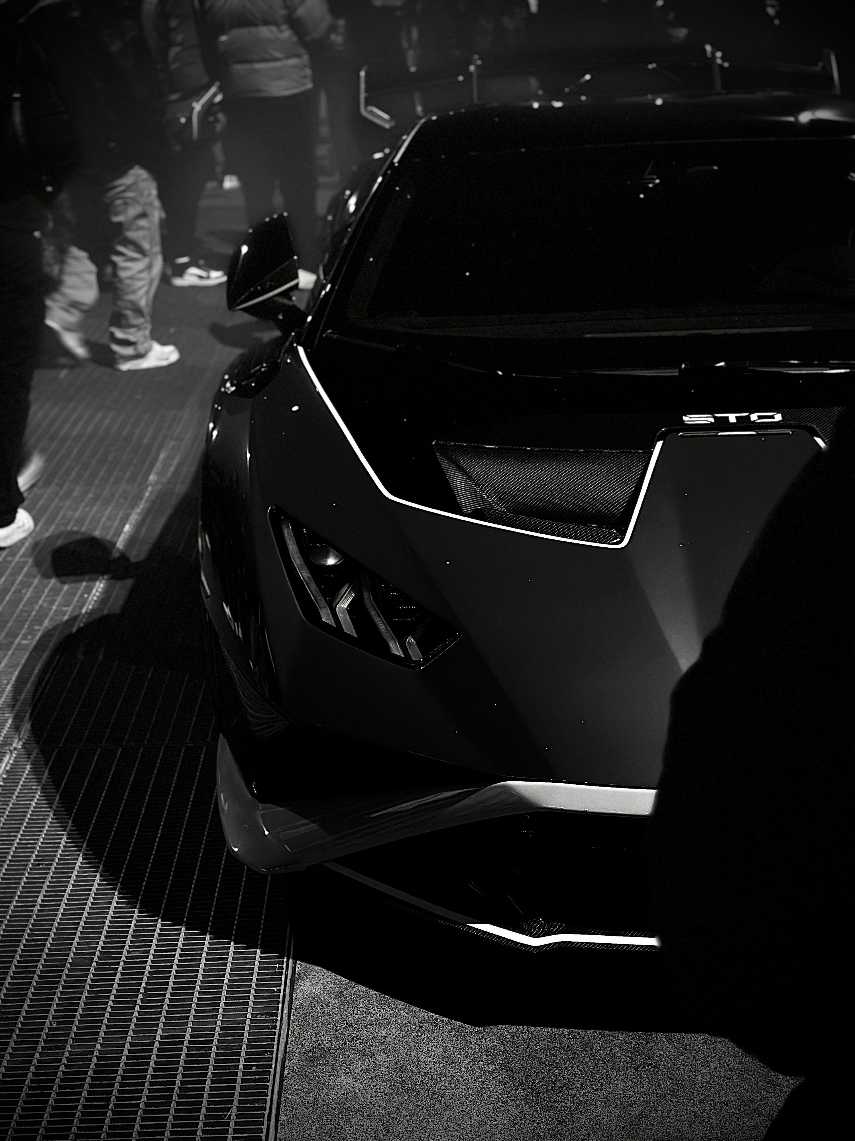 3000x4000 A black and white photo of a sports car