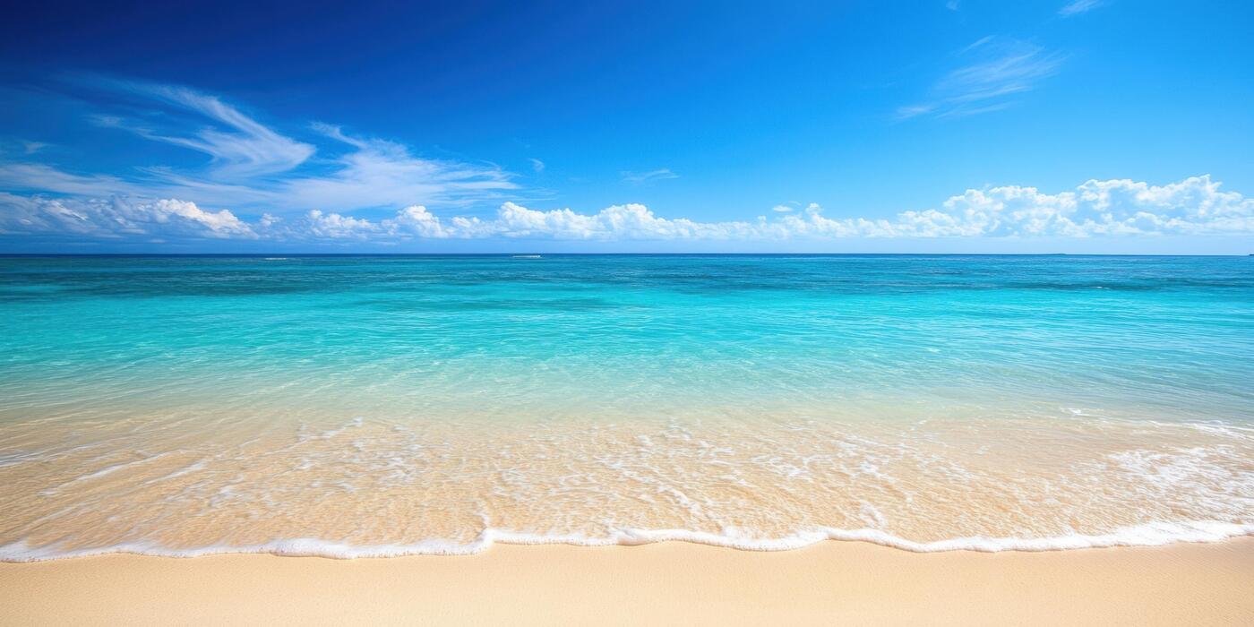 1400x700 Top down view of pristine tropical beach with clear blue waters and untouched sand for summer vacation design