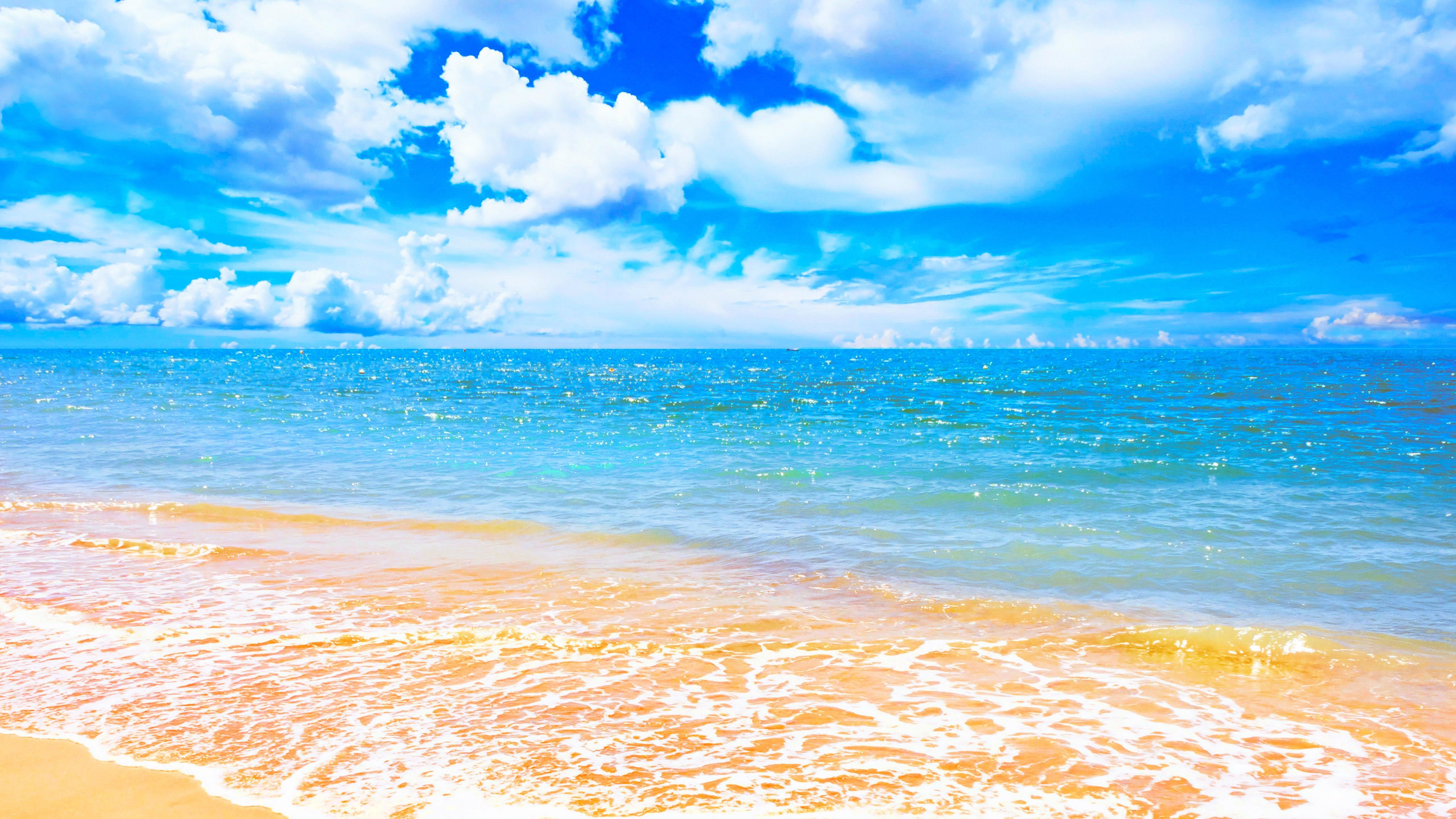 5120x2880 Brown Sand On Beach With Waves Under Cloudy Blue Sky During Daytime 4K 5K HD Beach Wallpaper