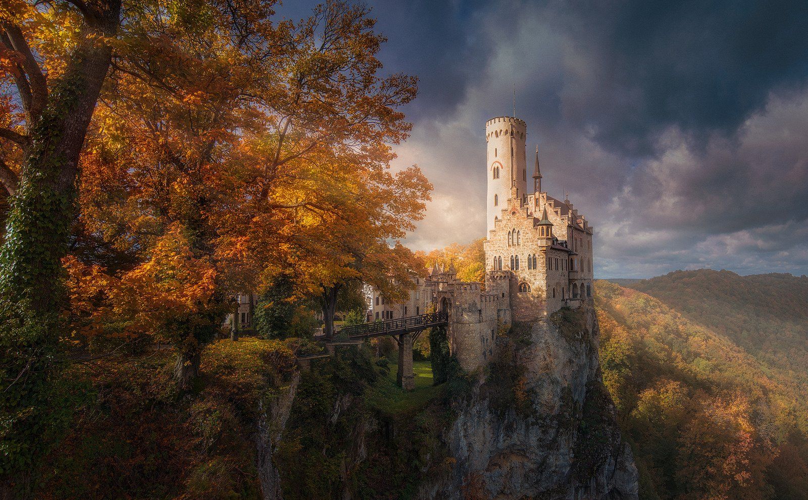1600x991 Majestic Fall Castle Amid Autumn Trees. HD Wallpaperx991