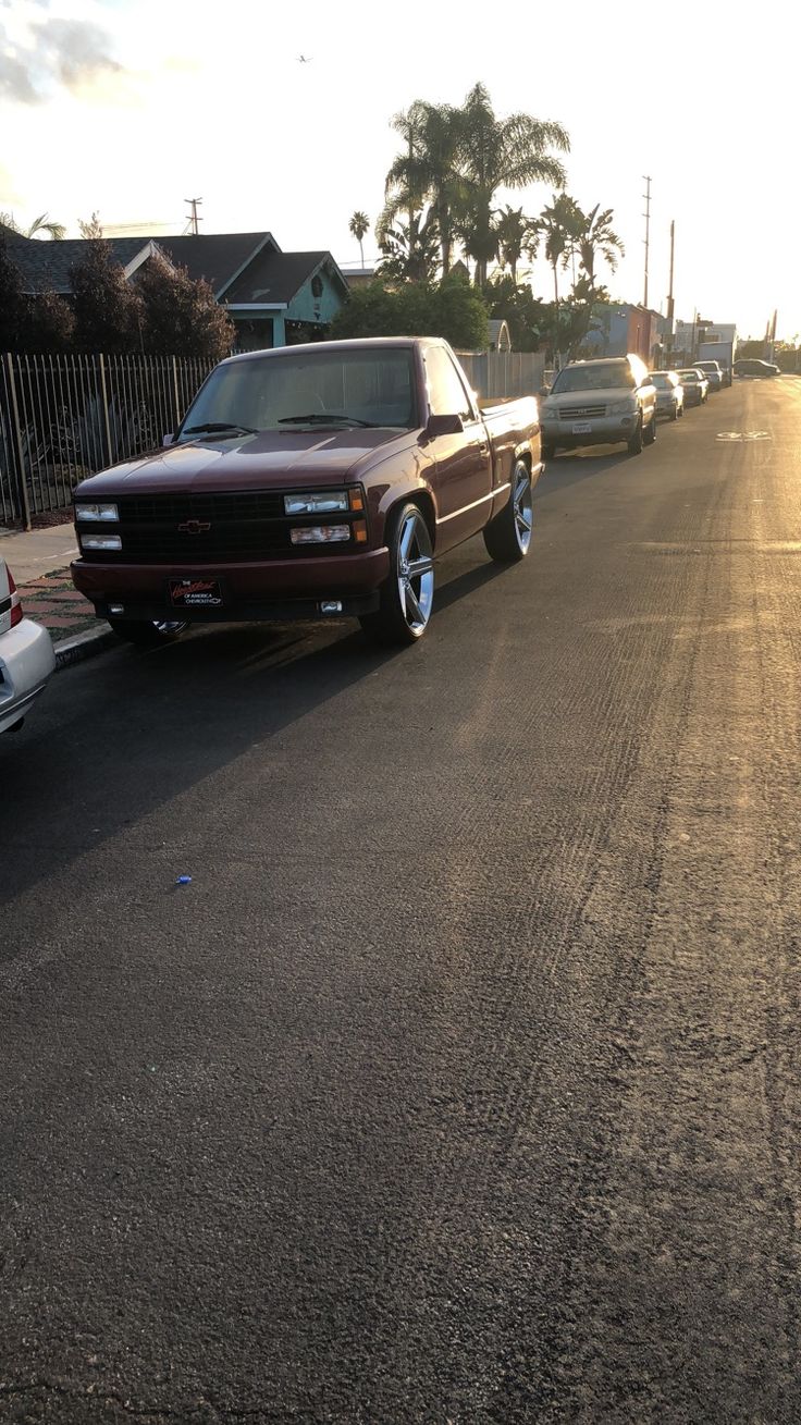 736x1309 Silverado Truck Parked on the Side of the Road. Lowered trucks wallpaper, Obs chevy wallpaper