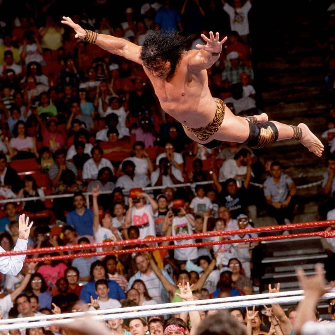 1080x1080 Download WWE Legend Jimmy Snuka's Signature High Flying Move Wallpaper